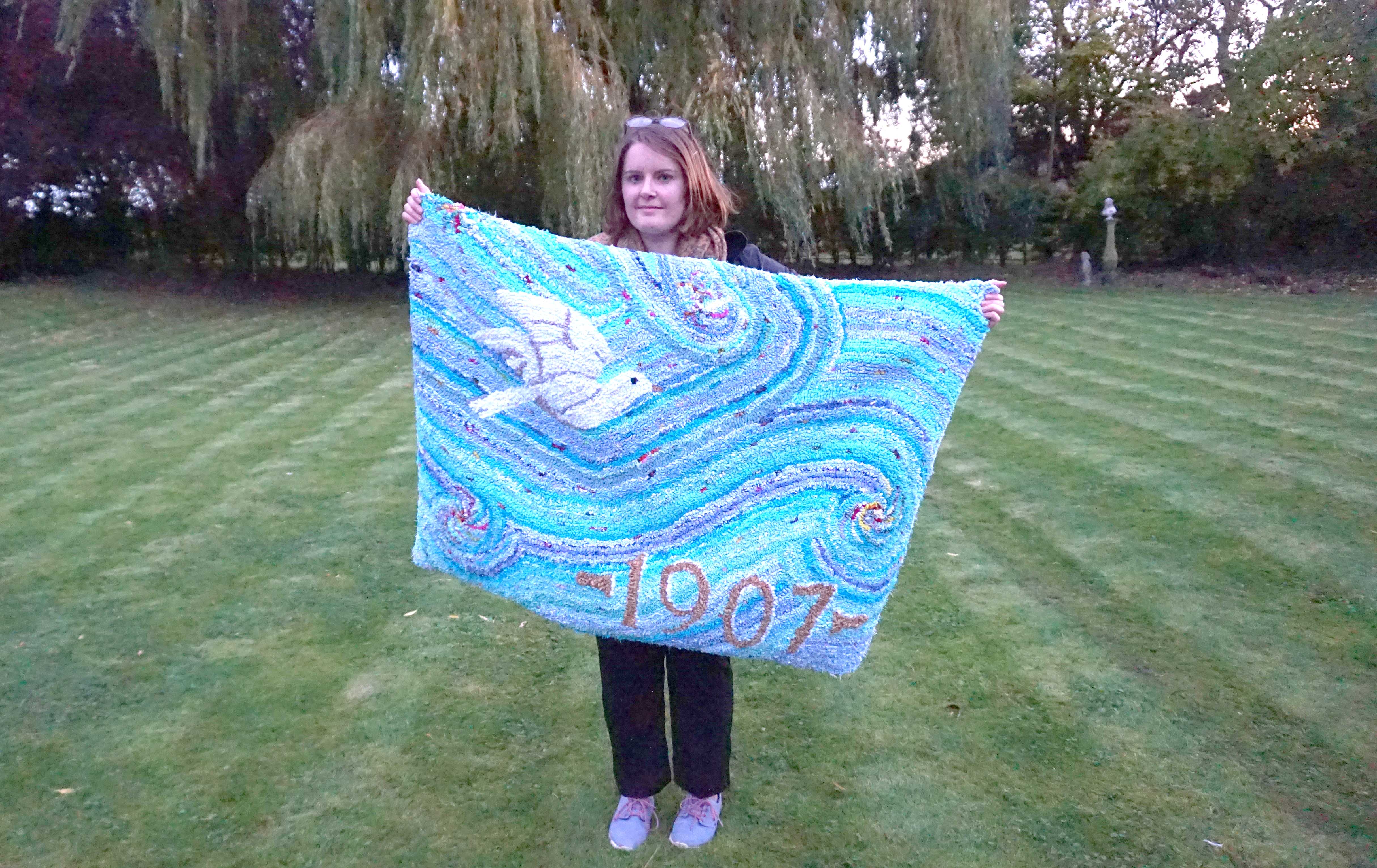 Elspeth Jackson with her finished rag rug wall hanging