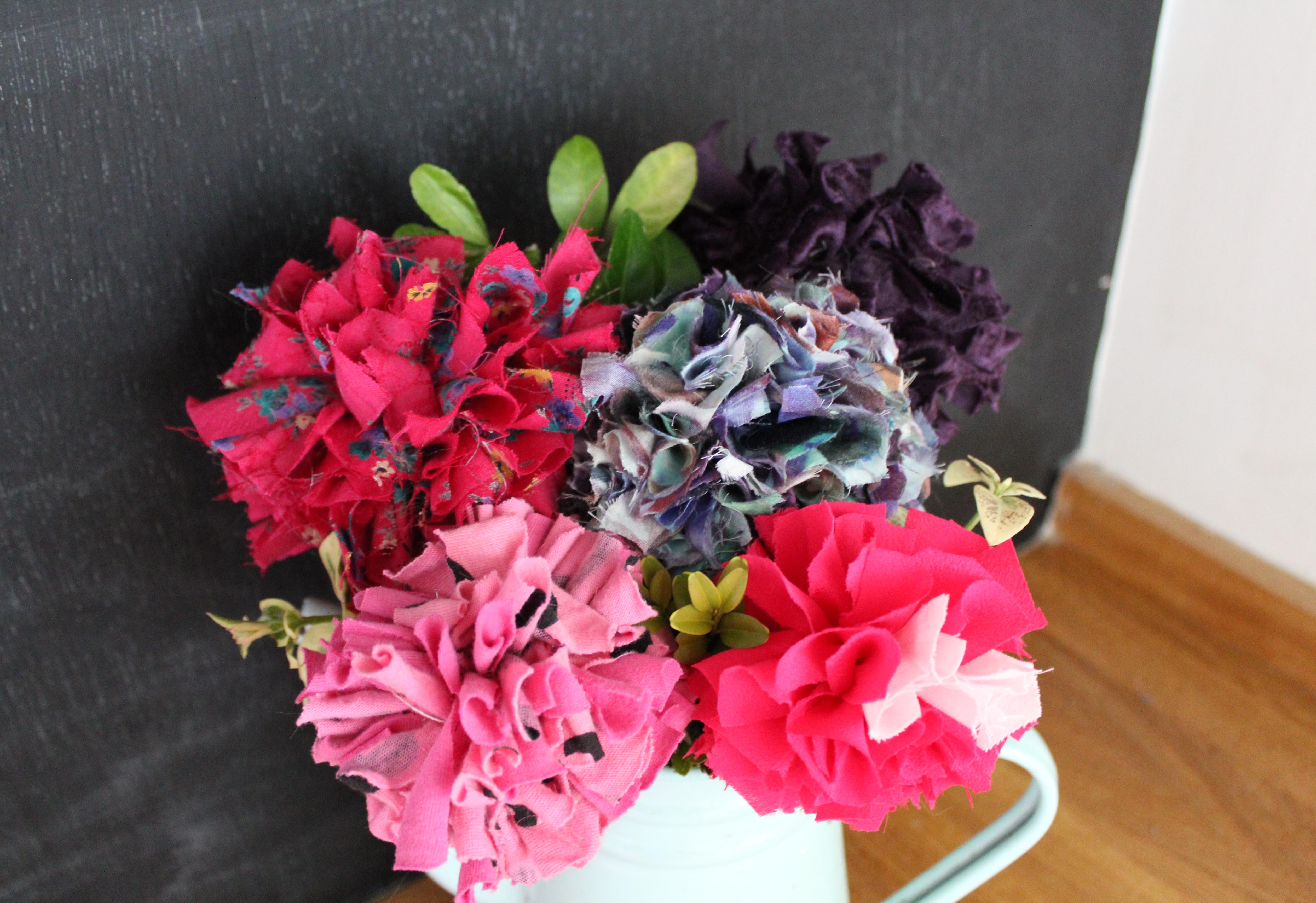 Rag rug fabric flowers made from recycled clothing in a bouquet