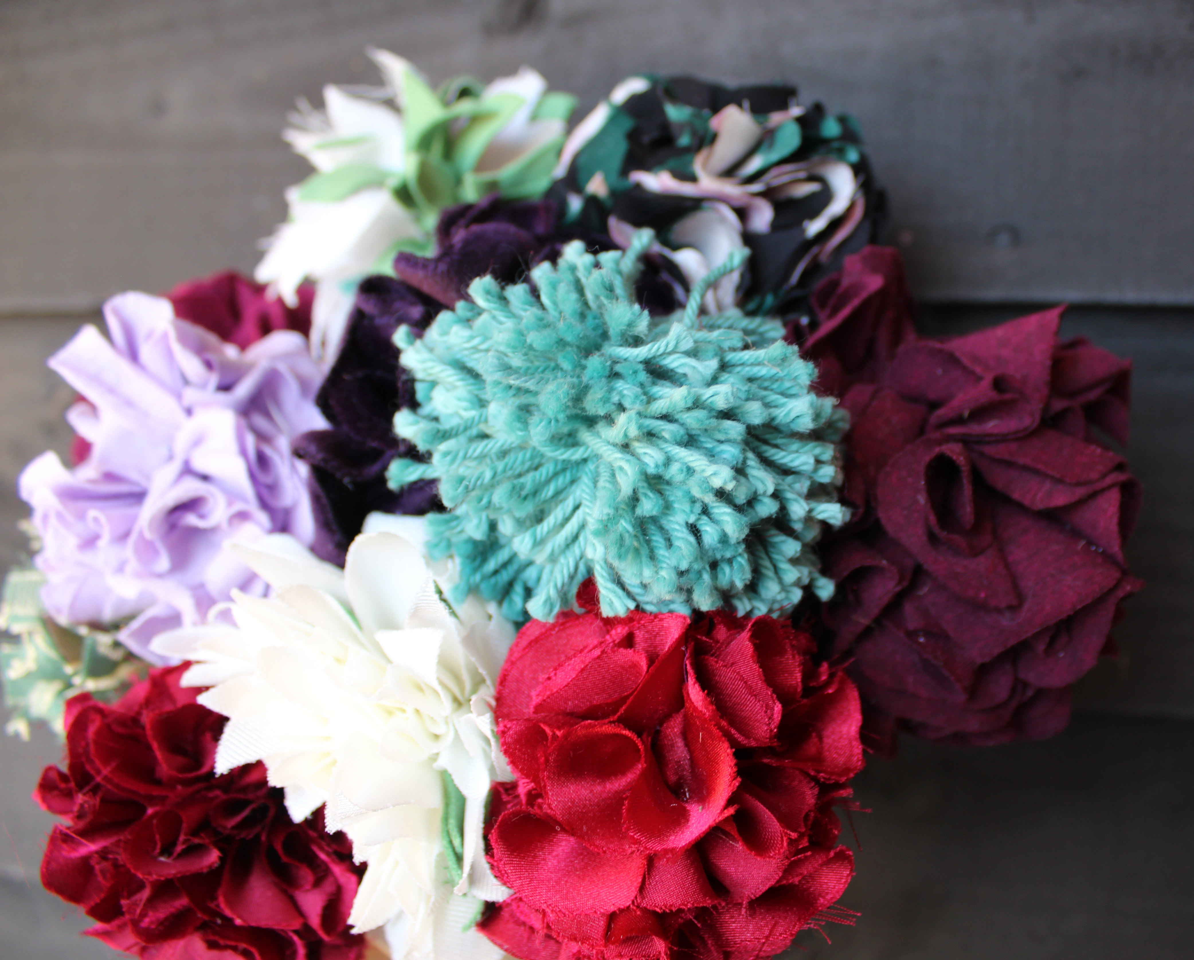 Rag rug bouquet of fabric flowers made using textile waste and wool