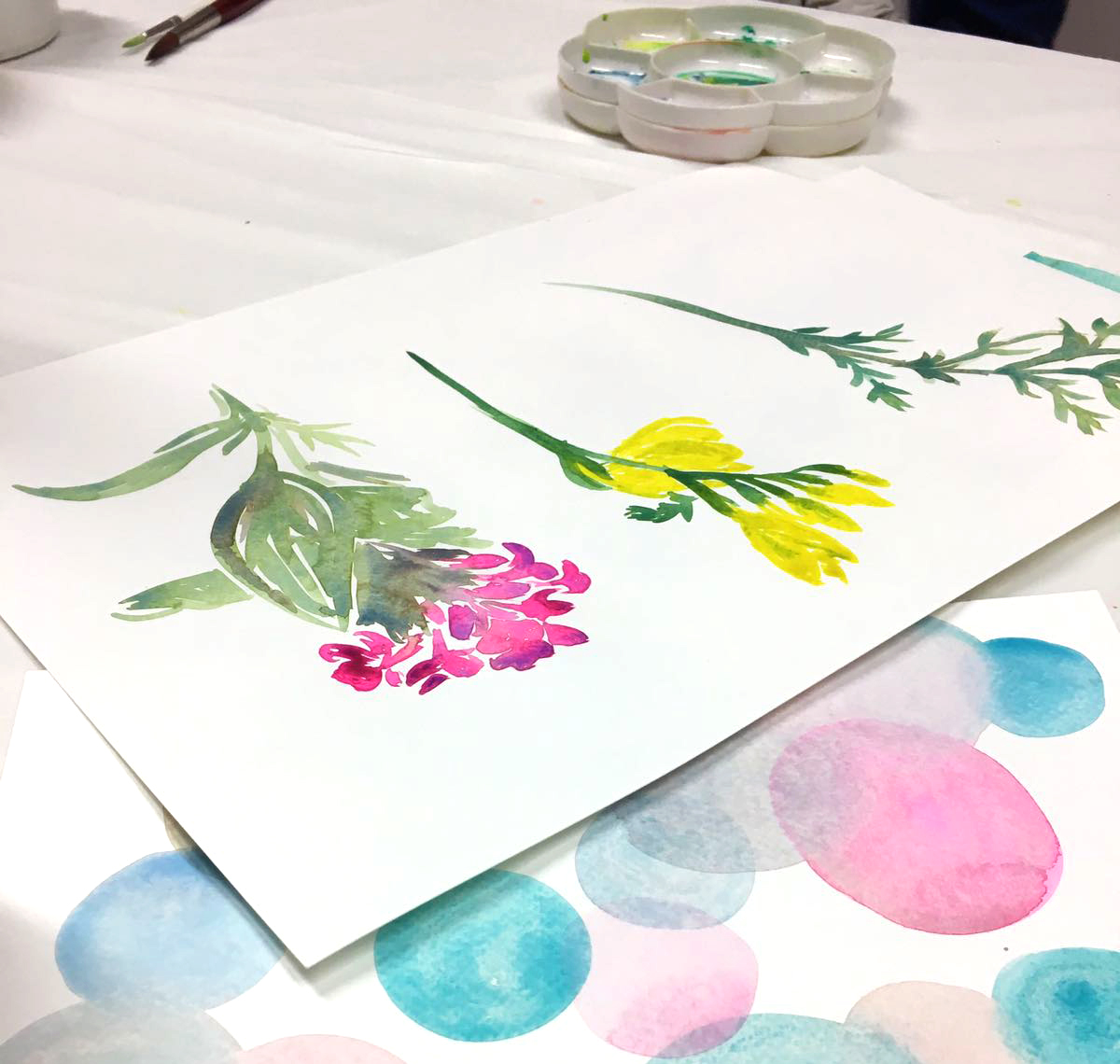 Different watercolour flowers at a watercolour workshop in London