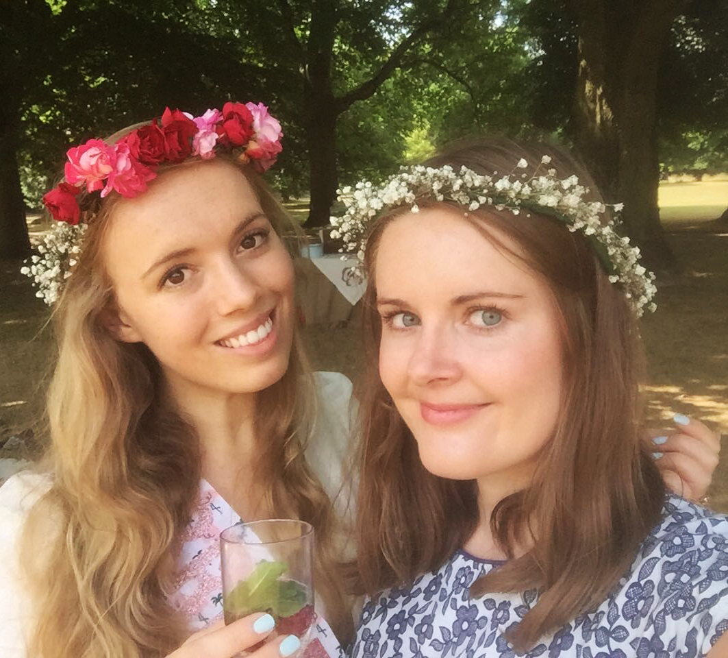 Bride and hen do organiser in handmade flower crowns made of gysophilia and roses. 
