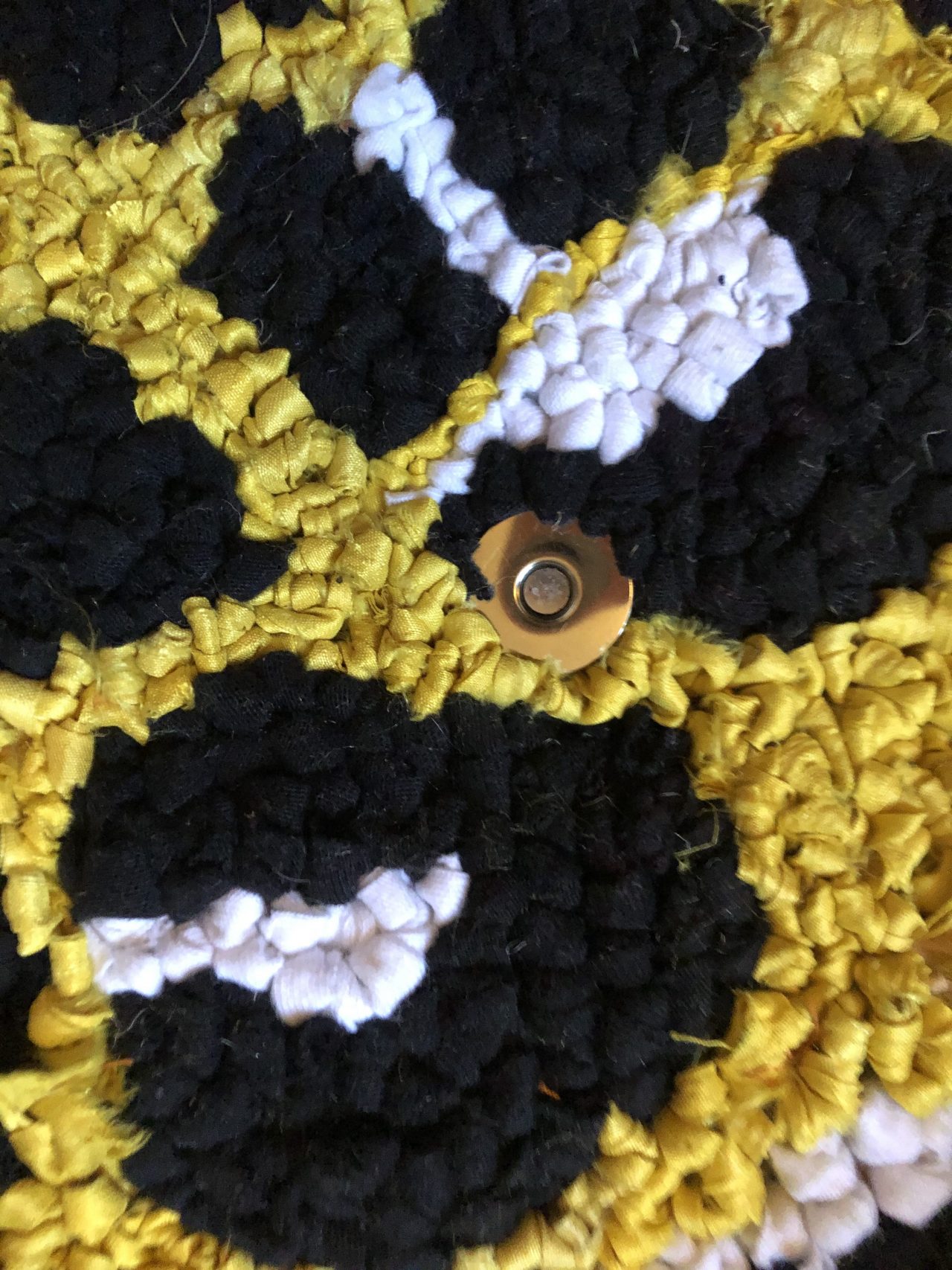 Yellow hooked rag rugging