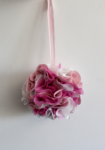 pink and purple hanging party pom pom