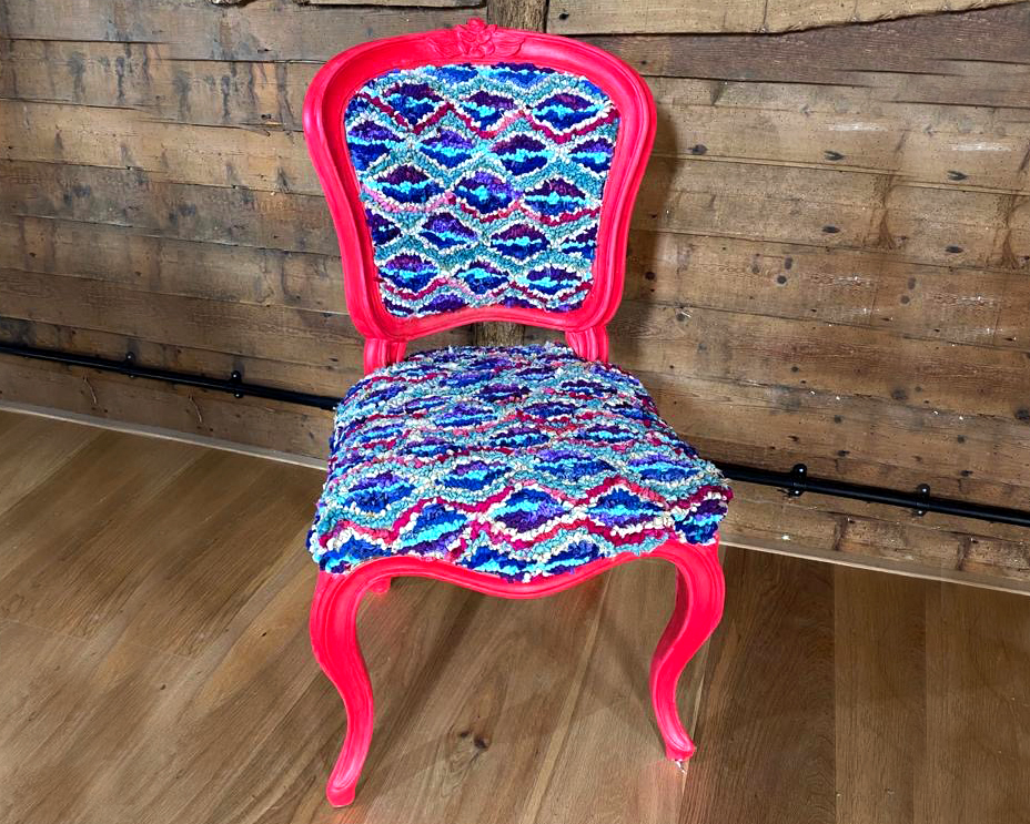 Colourful upholstered rag rug chair