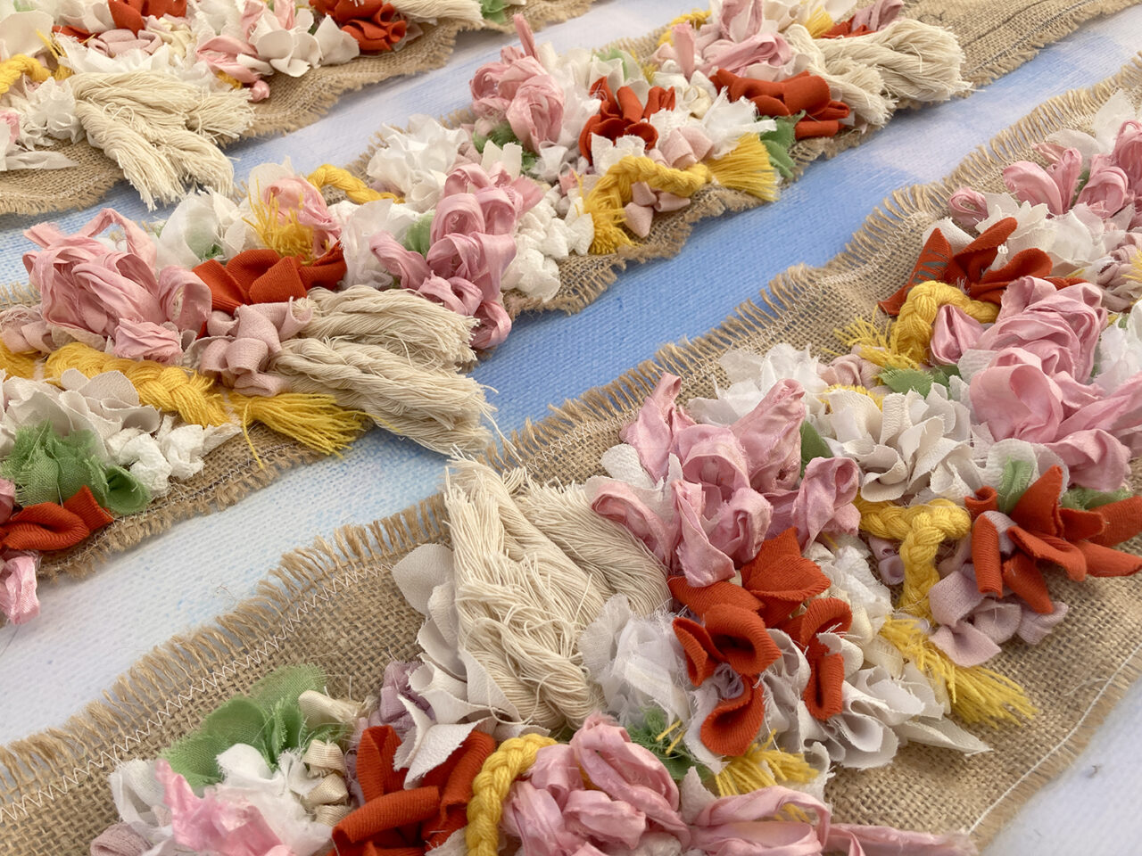Textile art border for handmade wedding table plan
