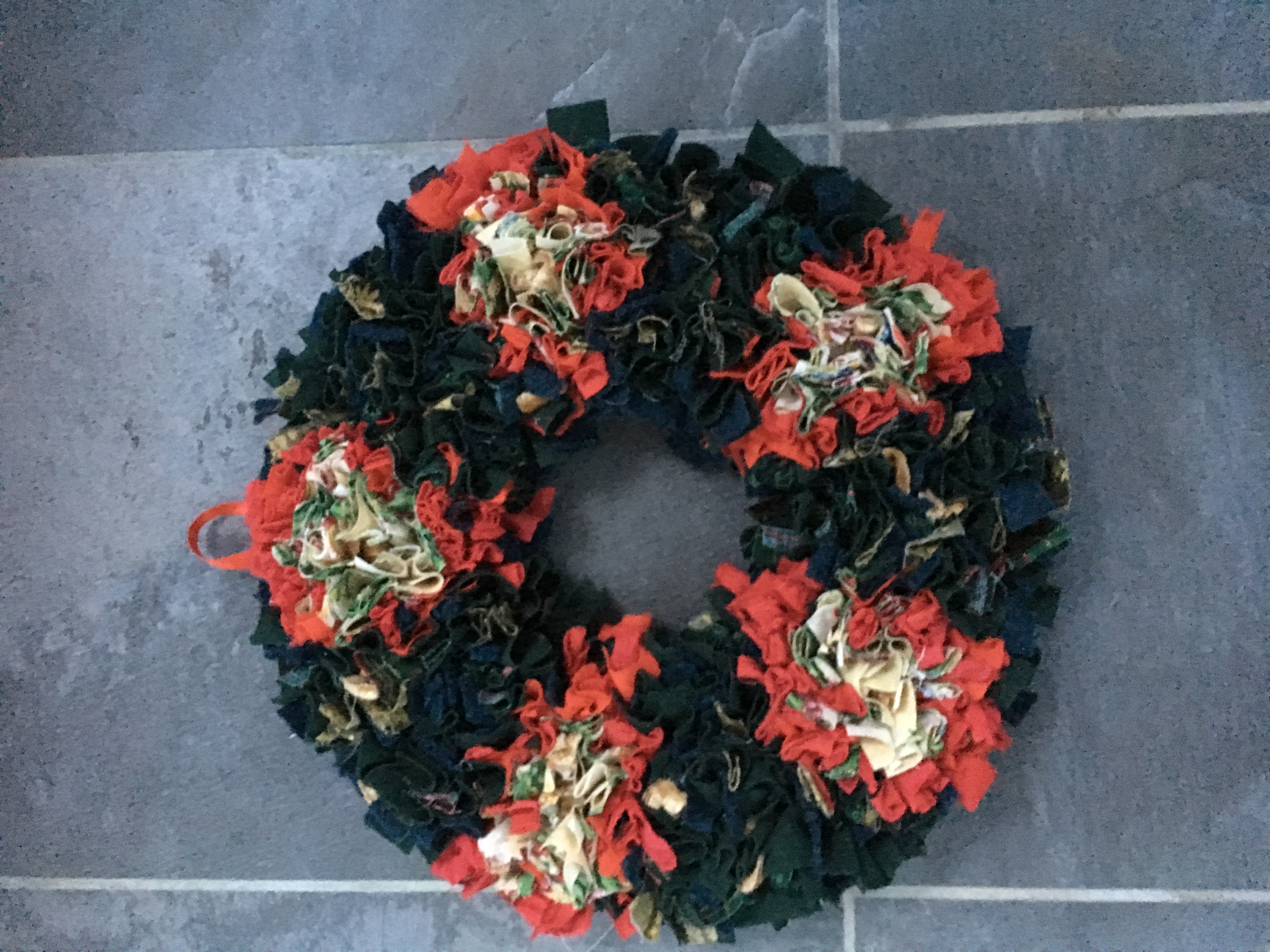 Traditional rag rug Christmas wreath made out of rags