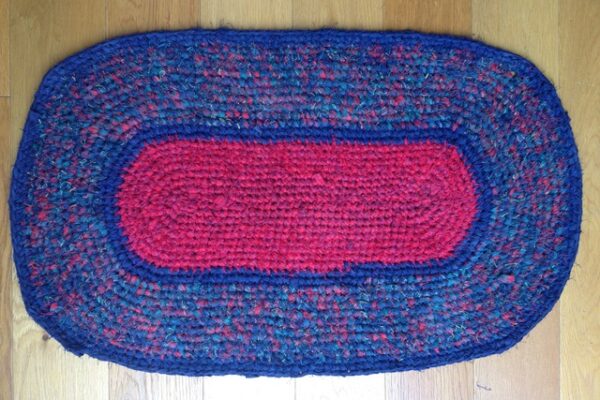 Oval pink and blue recycled rag rug