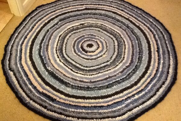 Large circular crocheted rag rug