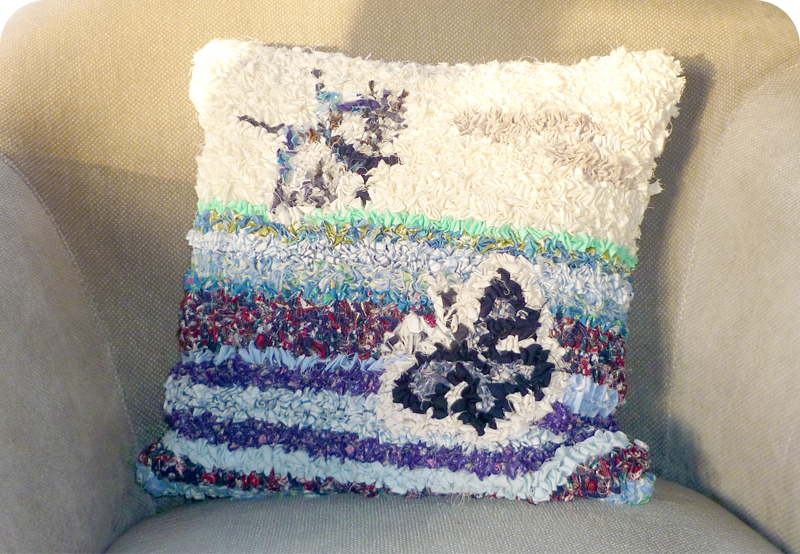 Hooky rag rug cushion with butterflies