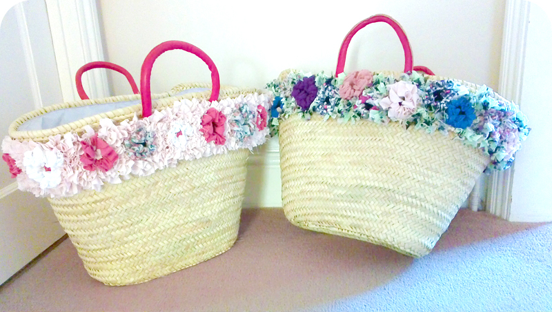 Wicker baskets with rag rug flower trim in the shaggy rag rug technique
