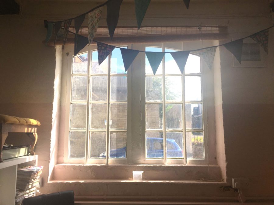 A Window with Bunting at The Craft Space in Trowbridge