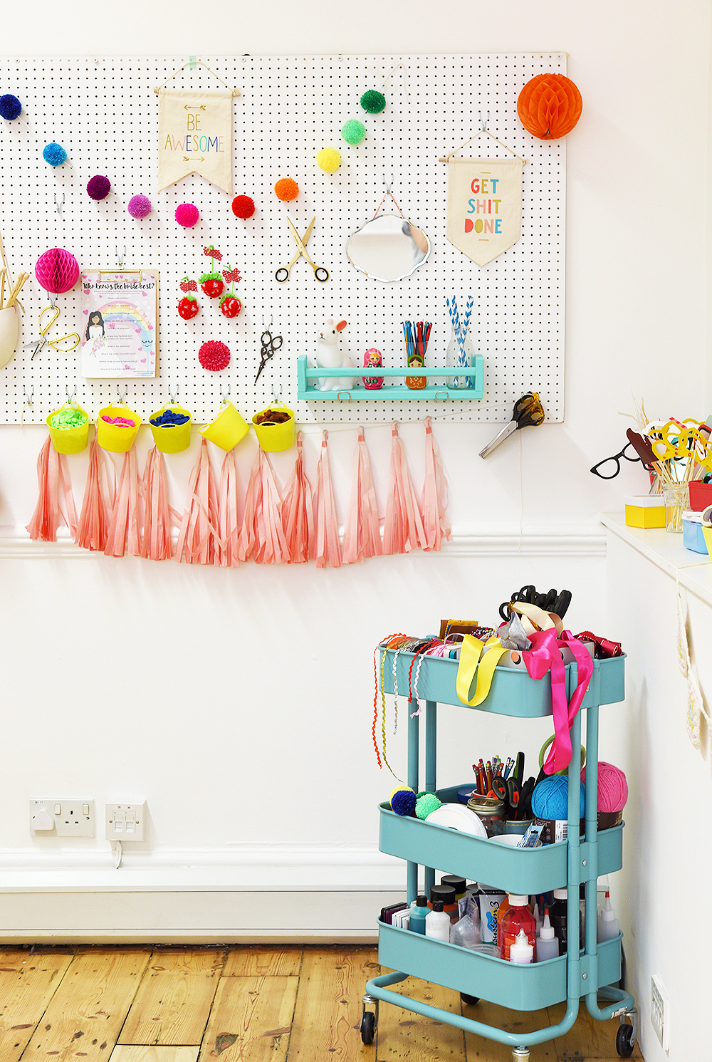 Ikea Trolley Packed with Craft Tools in front of beautiful white pegboard