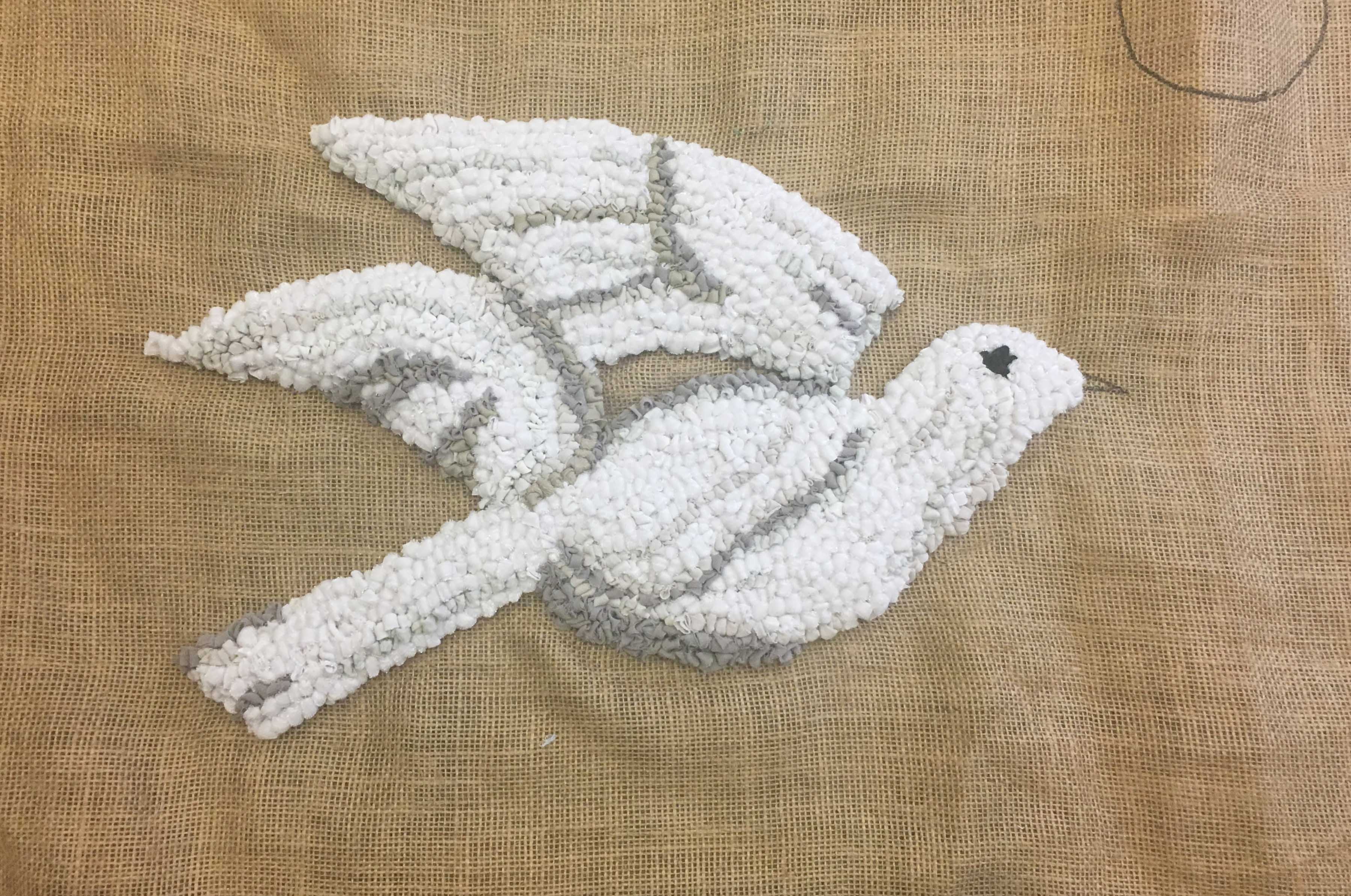 White Rag Rugged Bird in Loopy rag rugging technique on hessian base