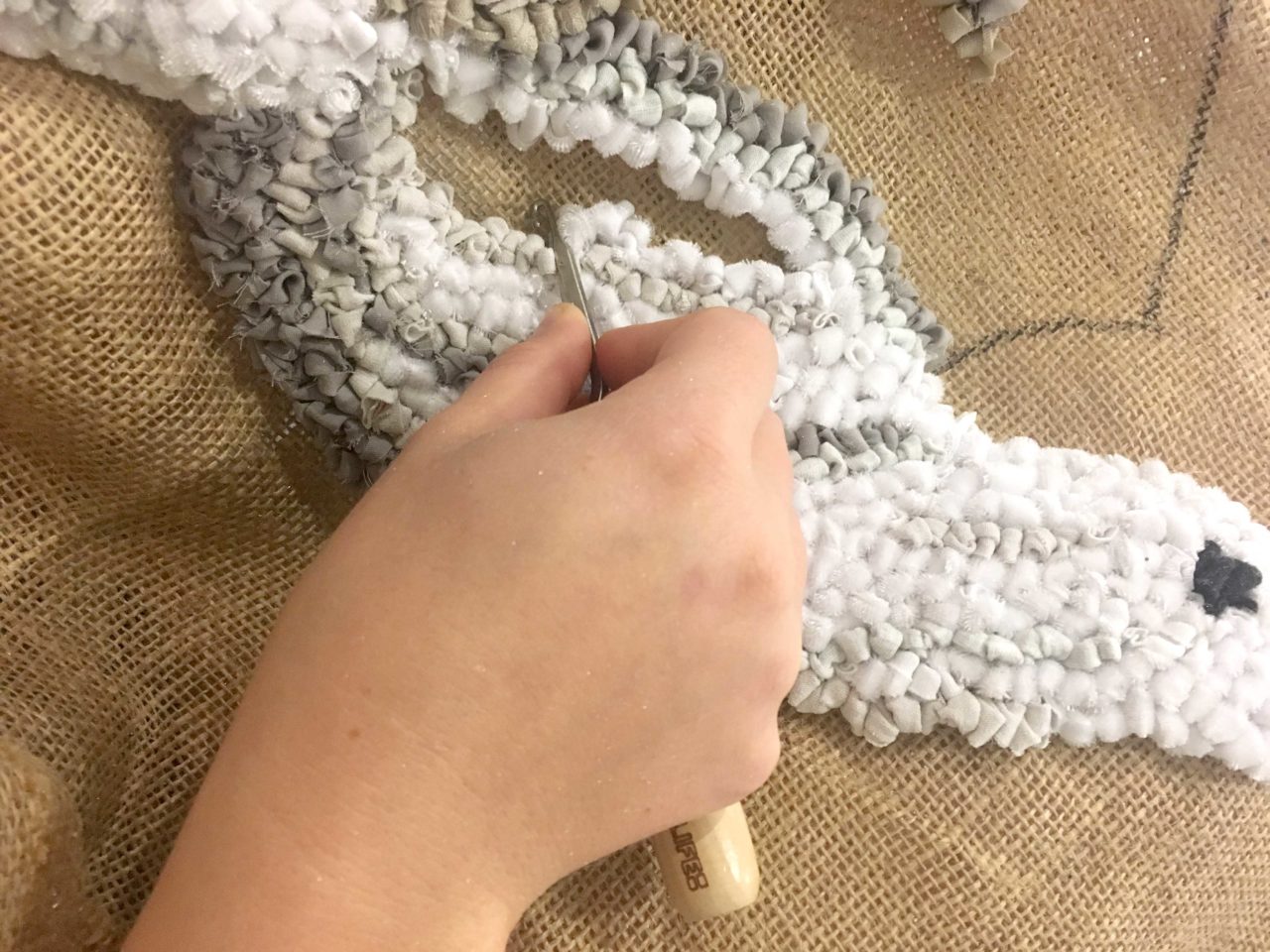 Rag Rugging with a Latch Hook and white and grey fabric
