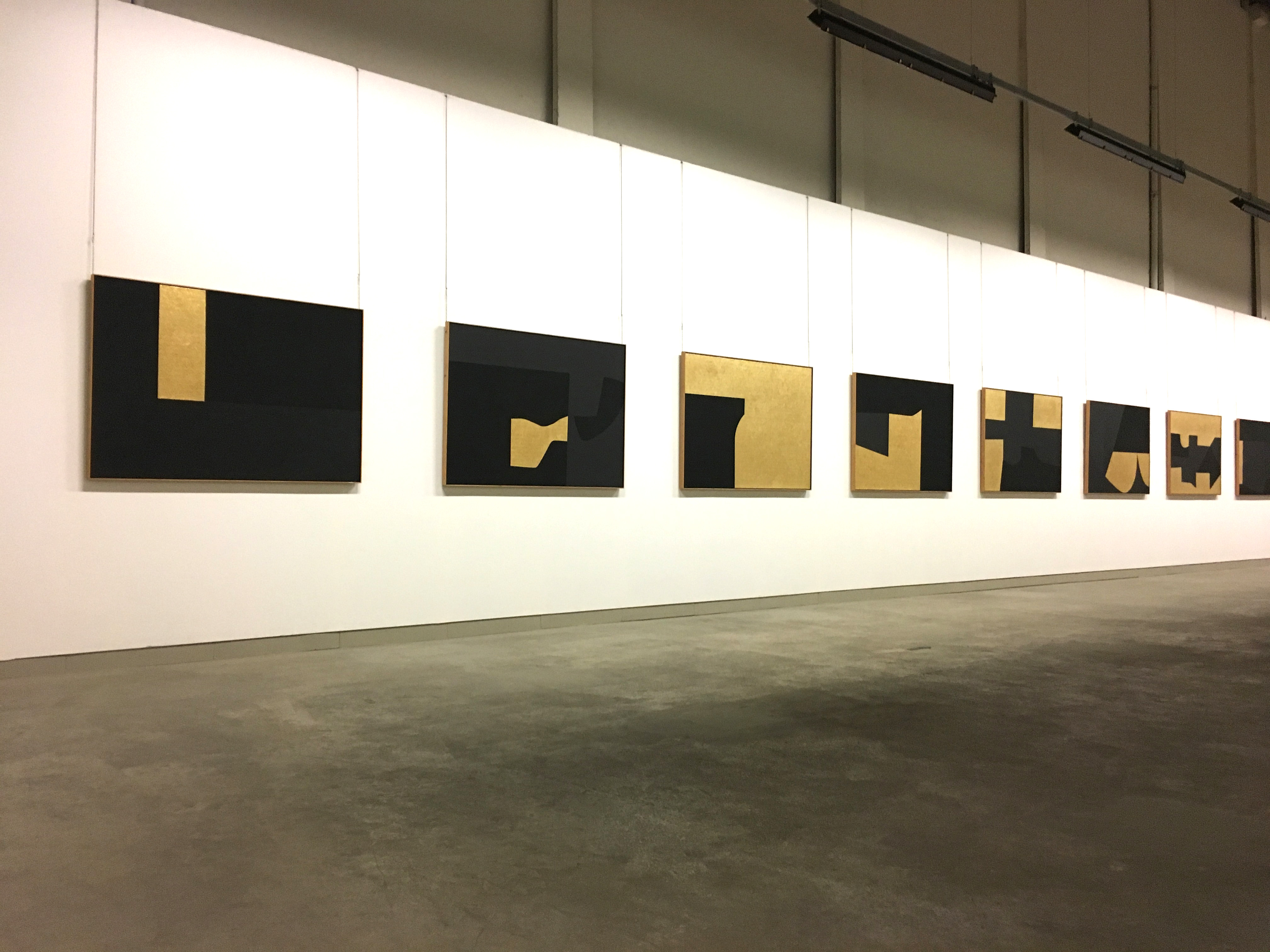 Gold and black artworks Alberto Burri