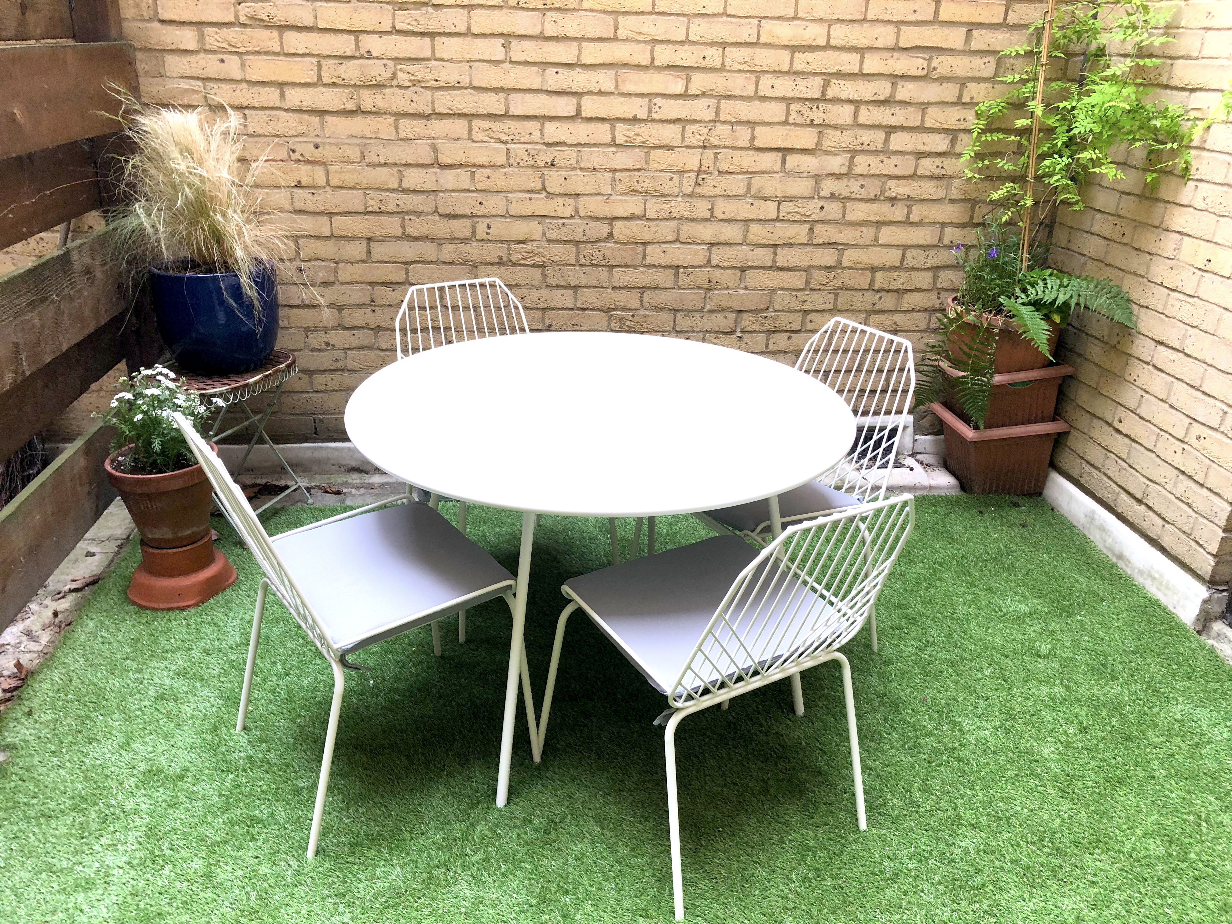 M&S White outdoor modern table and chairs with grey seat cushions