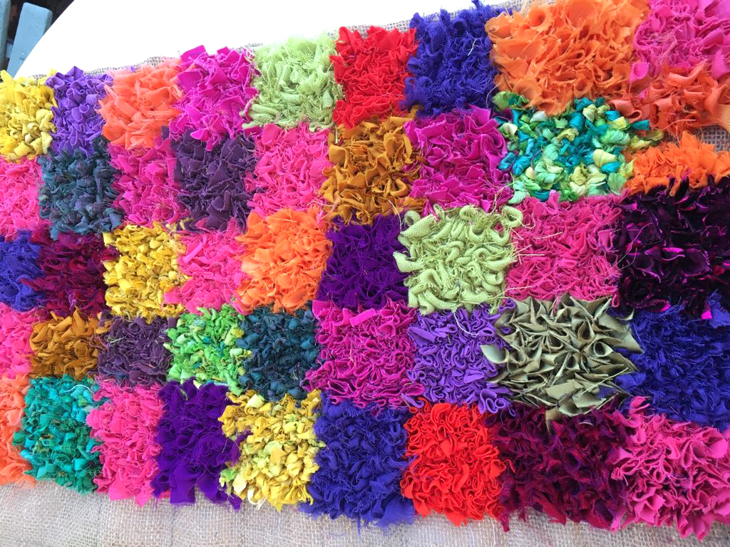 Check sari silk rag rug in bright modern colours made of upcycled saris