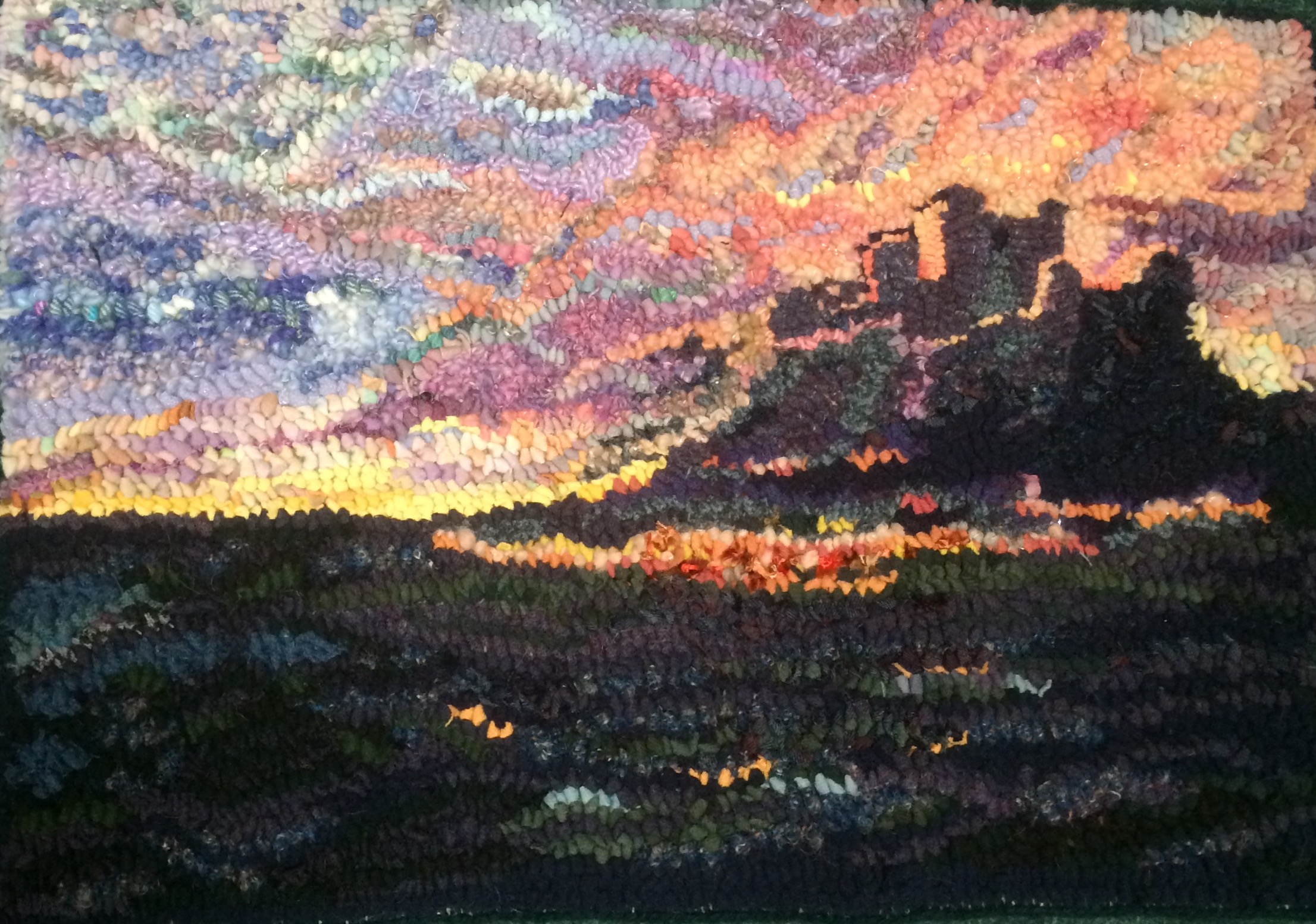Heather Ritchie Bambrough Sunset rag rug in the hooky technique castle 
