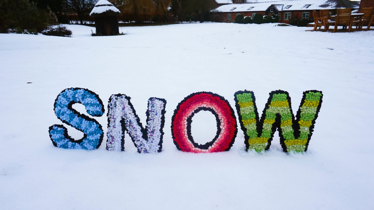 Rag Rug Letters in the Snow made using upcycled textile waste craft