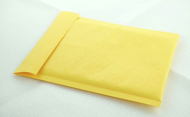 Brown padded envelope sustainable packaging for small businesses