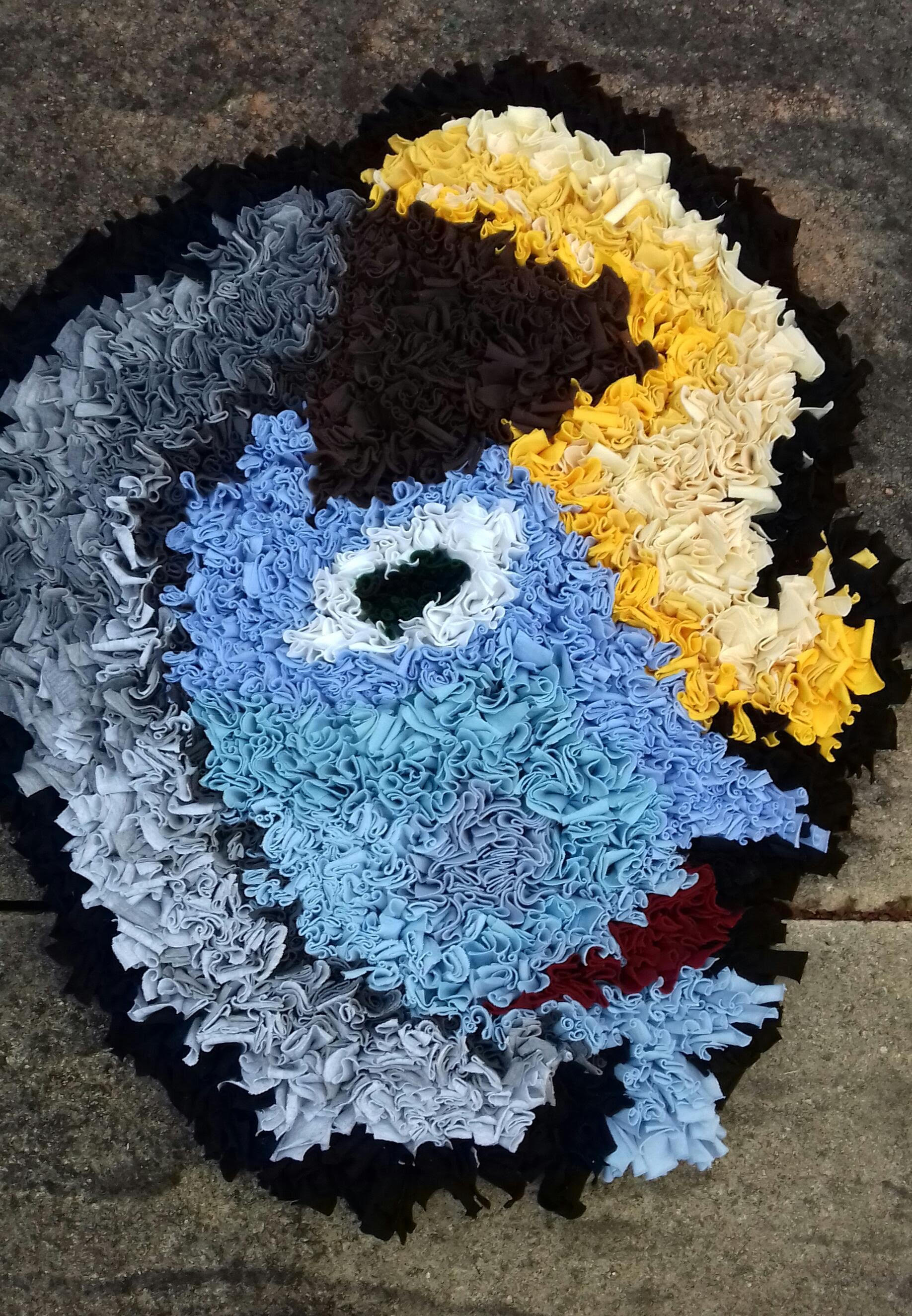 Picasso inspired rag rug head made using old t-shirts