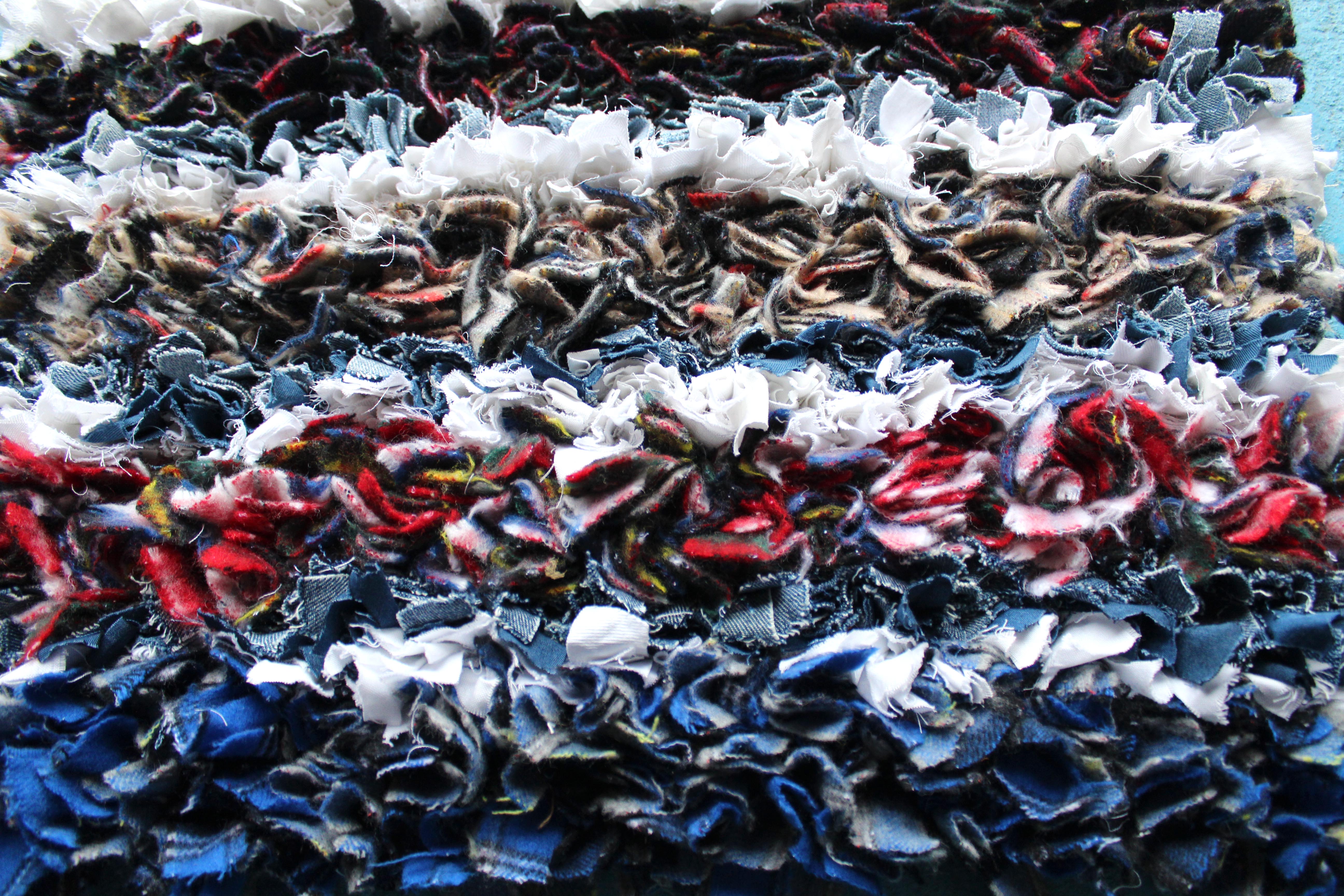 British traditional hessian rag rug made using old woollen blankets, jeans and shirts