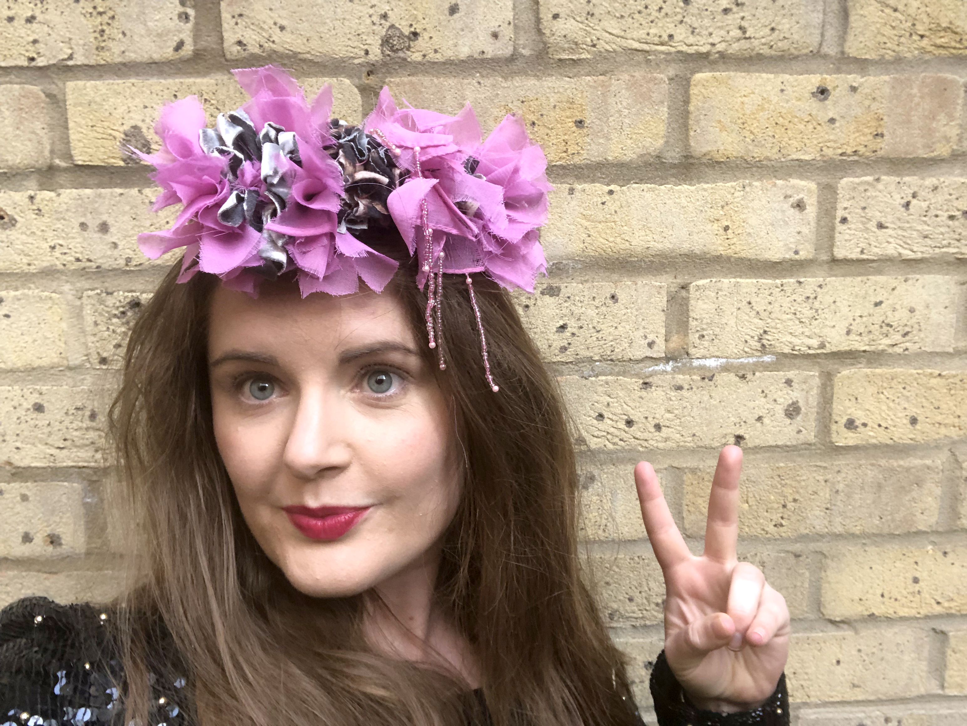 Elspeth Jackson from Ragged Life modelling a pink punk rag rug headband made using recycled materials