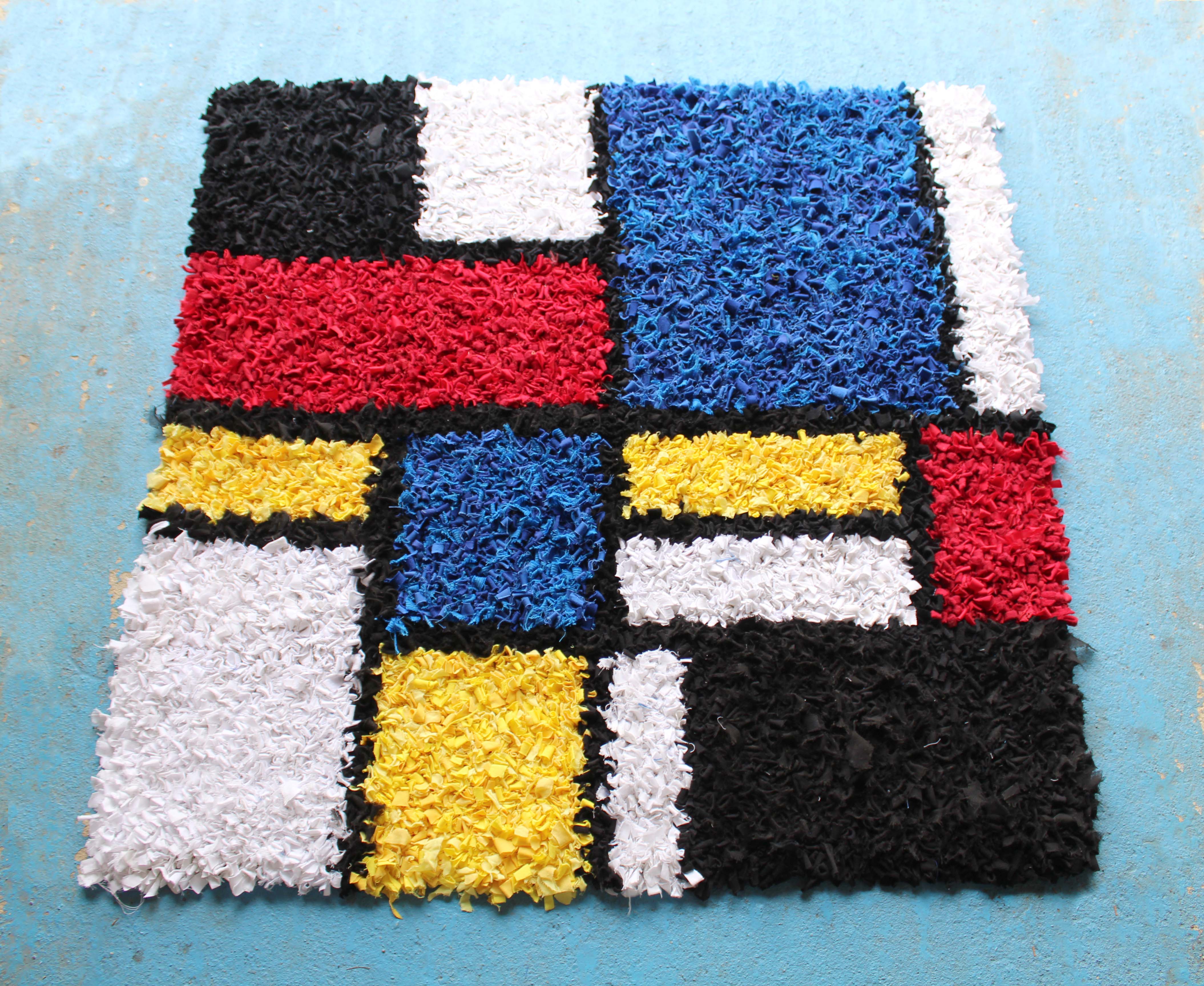 Handmade Mondrian Inspired Rag Rug made using recycled materials and old clothing