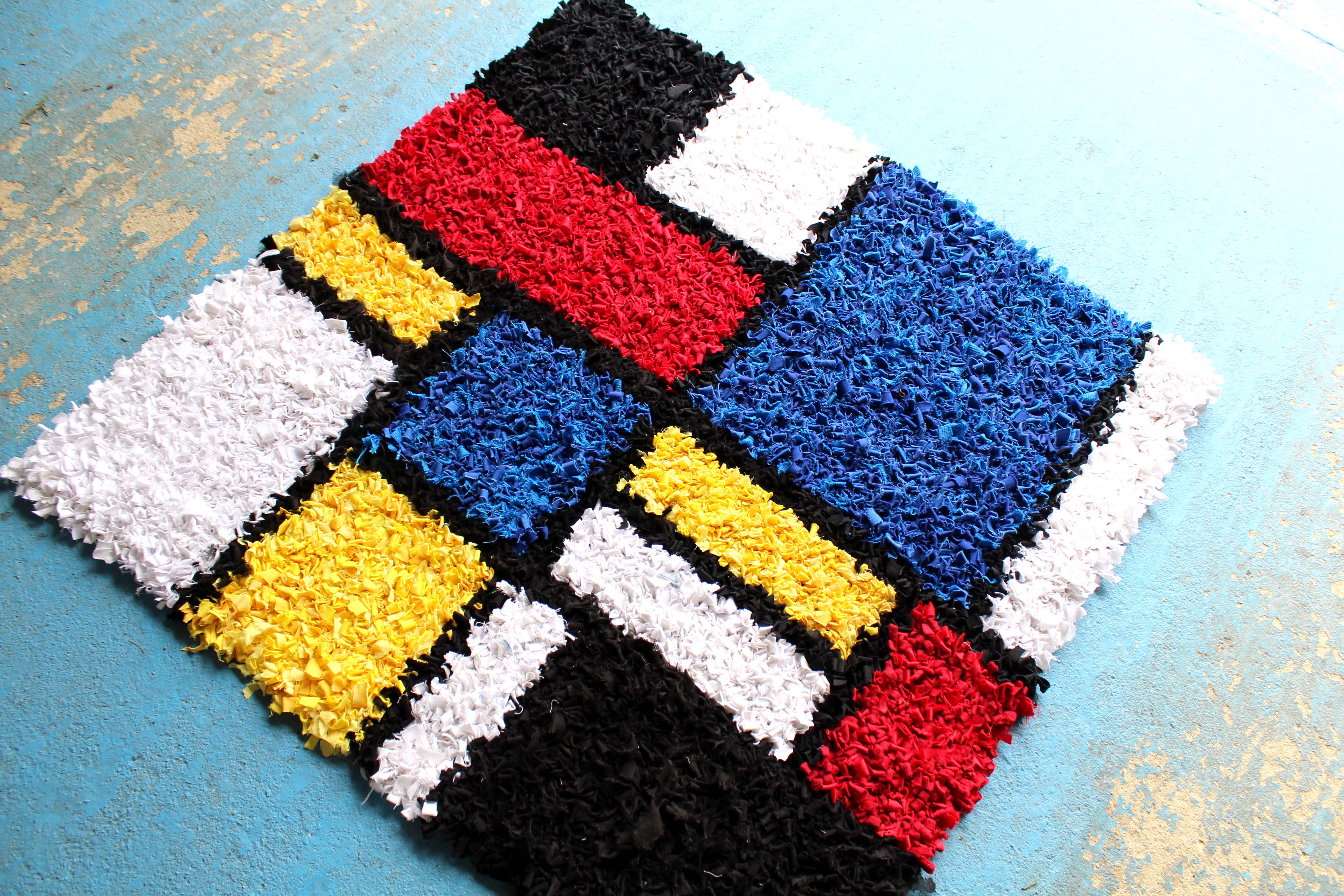 Rustic traditional British rag rug made using recycled materials that would otherwise go to landfill.