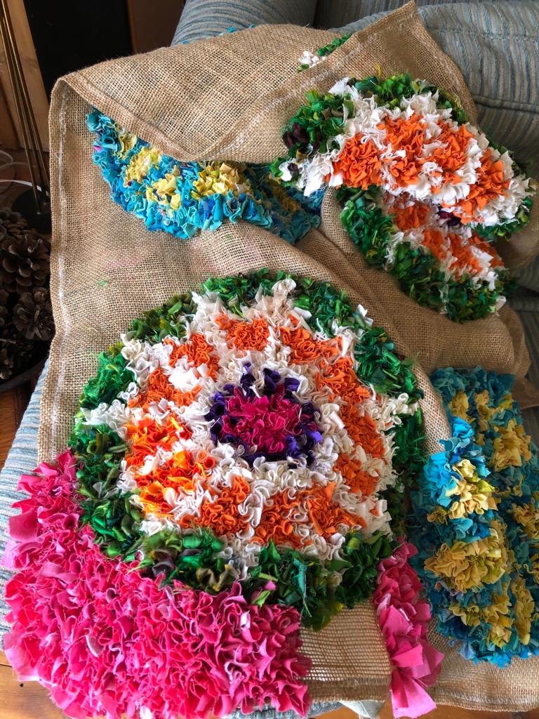 Making a handmade rag rug from old clothing and texile waste