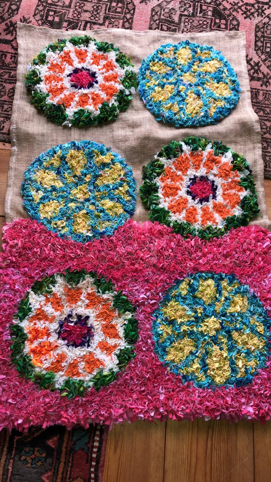 Work in progress half finished pink rag rug with circular geometric design