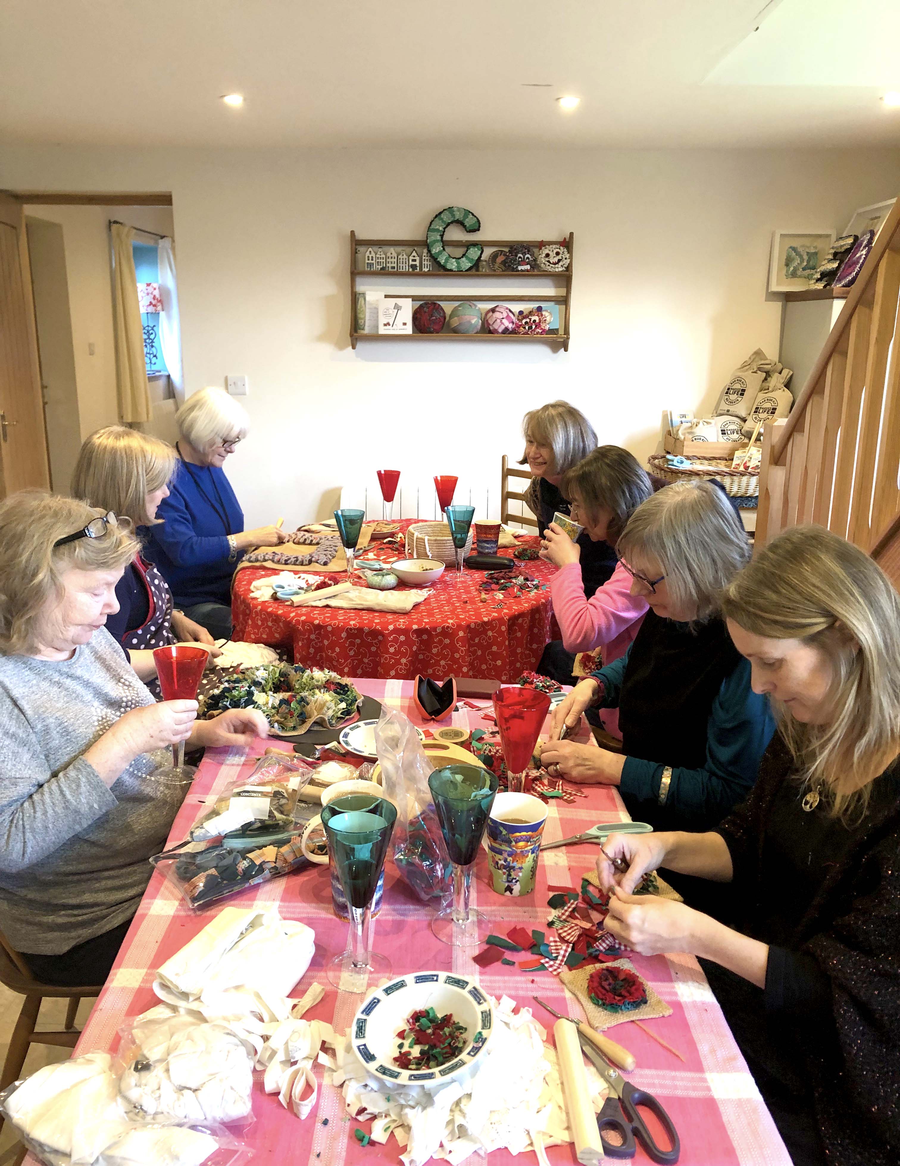 Rag rug makers hard at work at our rag rug social meet up
