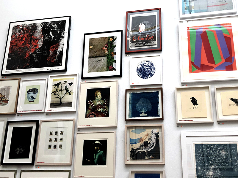 White wall covered in art at the Summer Exhibition 2019