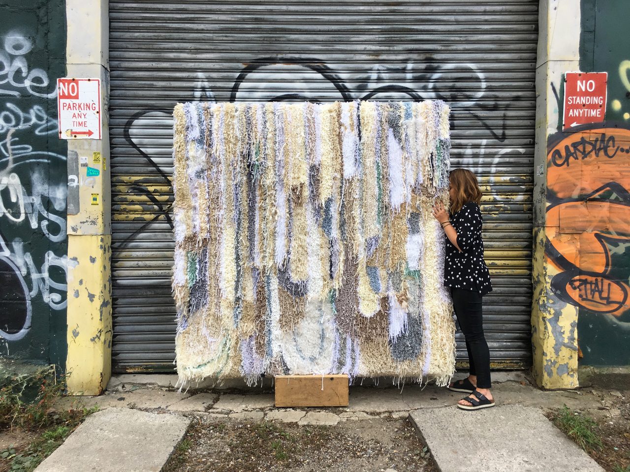 Trish Andersen Fibre Artist with Cream Tufted artwork wall hanging rug