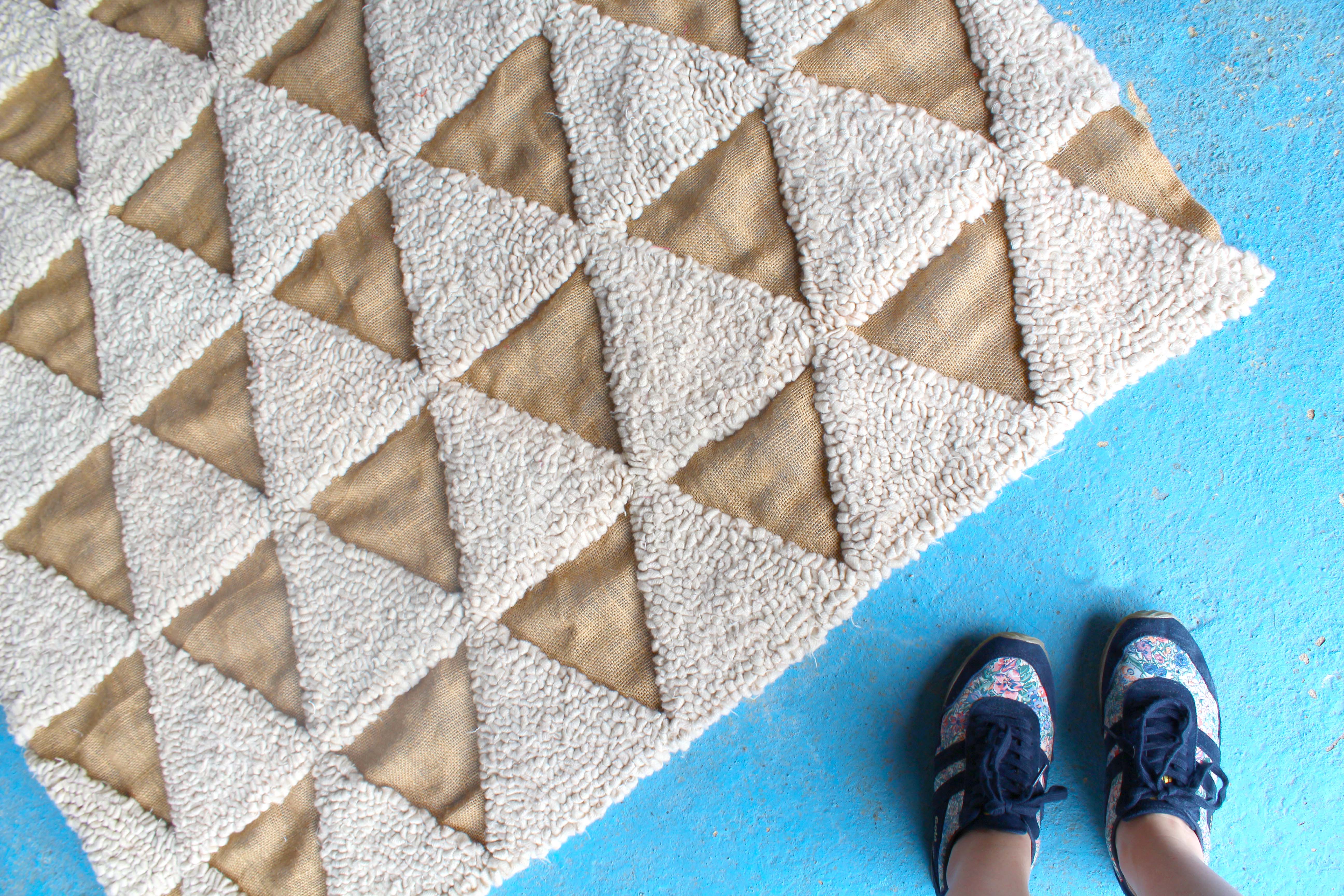 Handmade simple rag rug with triangle geometric design