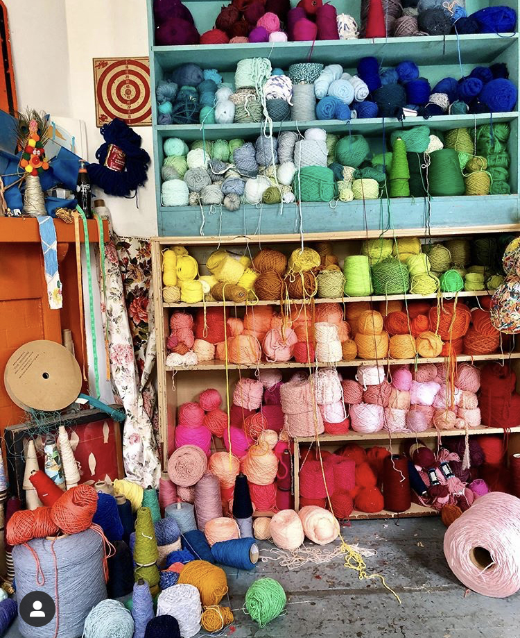 Organised shelves of wool and yarn