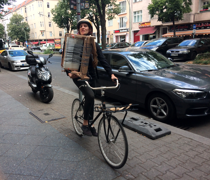 Abigail Wheeler Riding Bike With Table Loom