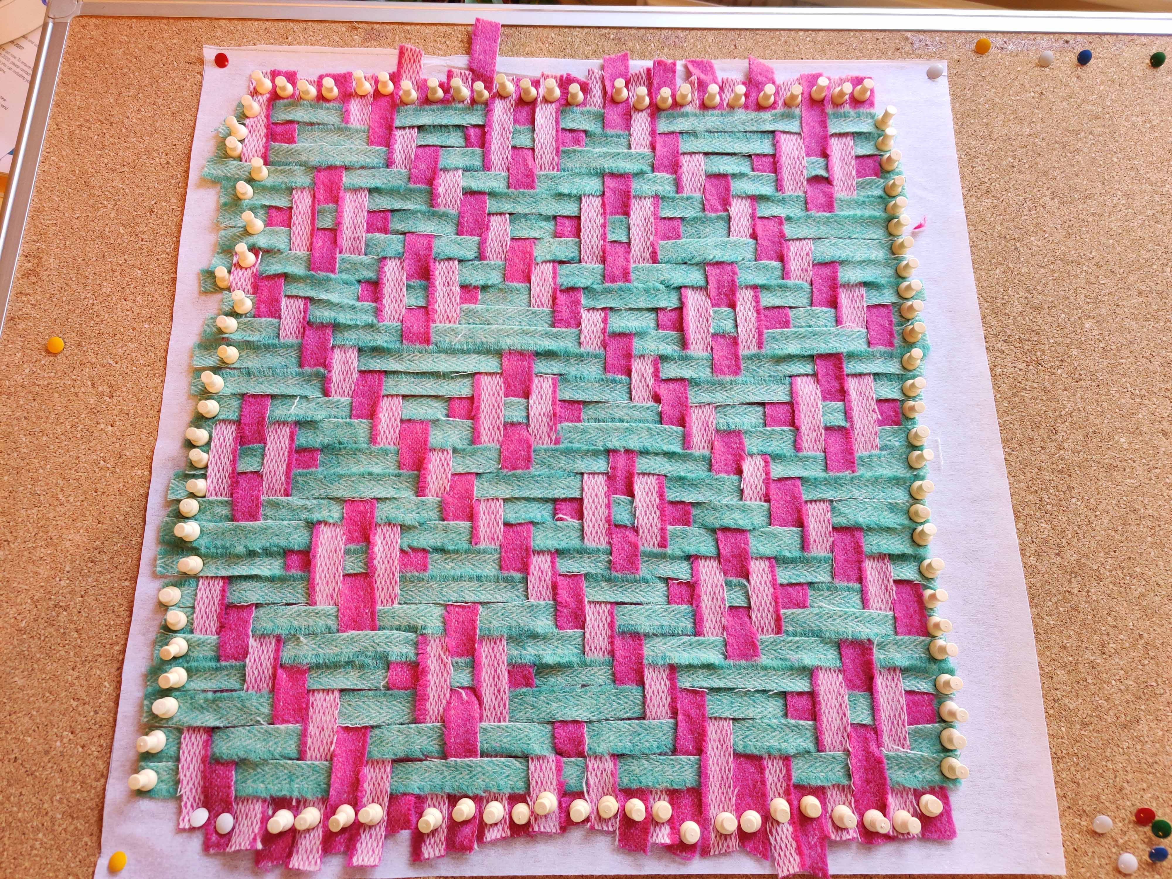 Handmade cushion made using ribbon weaving techniques