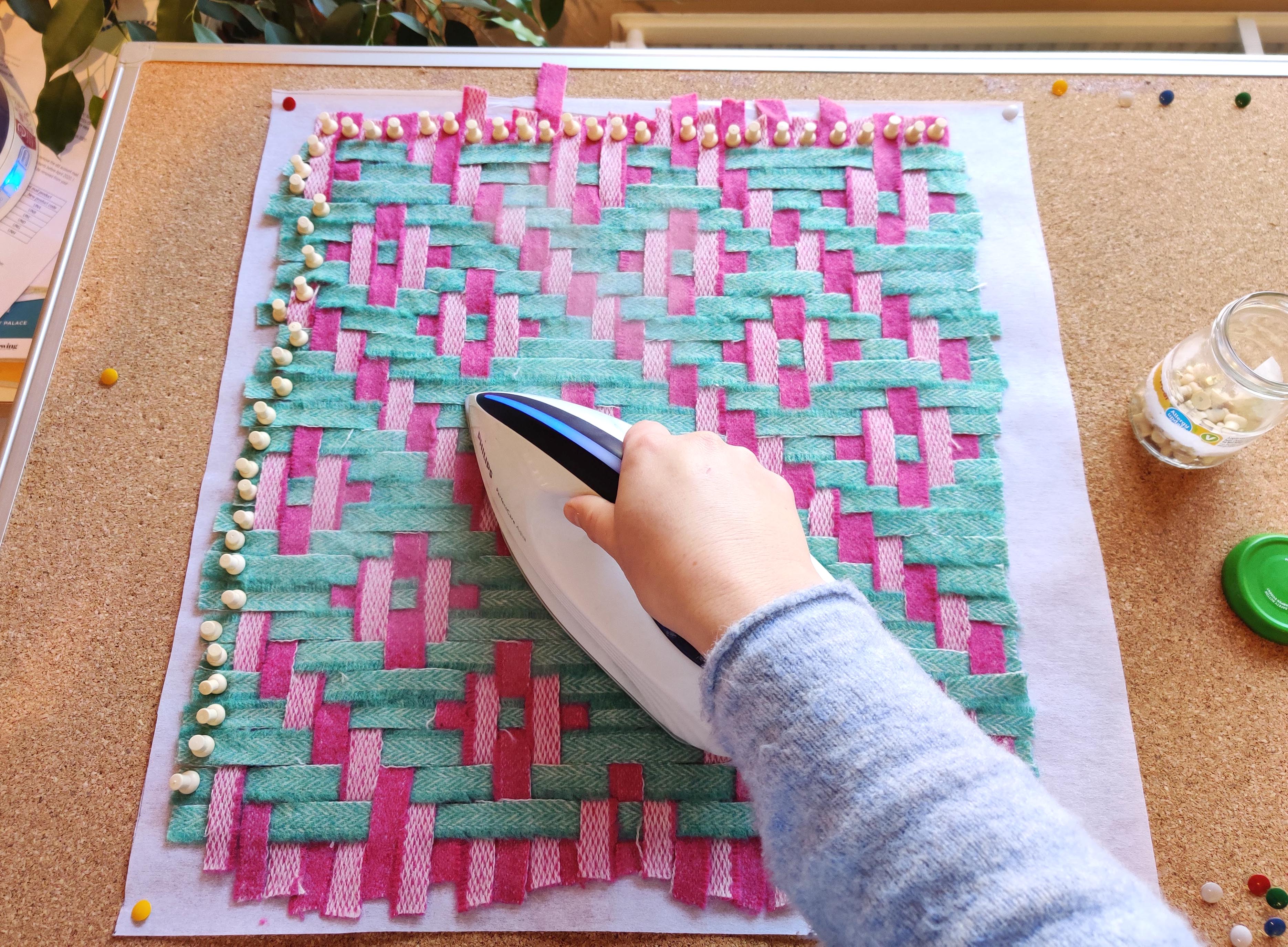 Ironing blanket yarn onto iron on interfacing