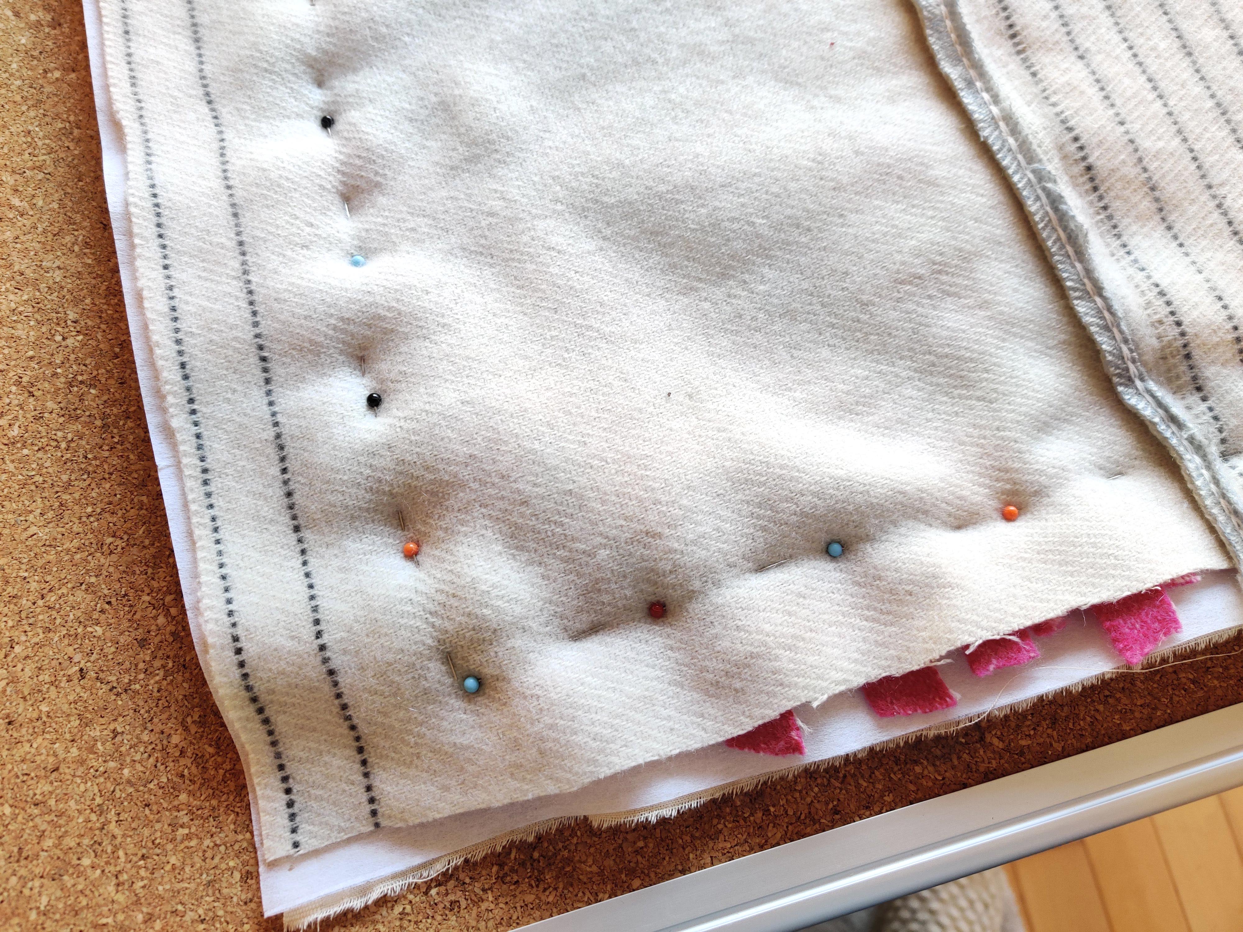 Pinning an envelope back for a cushion