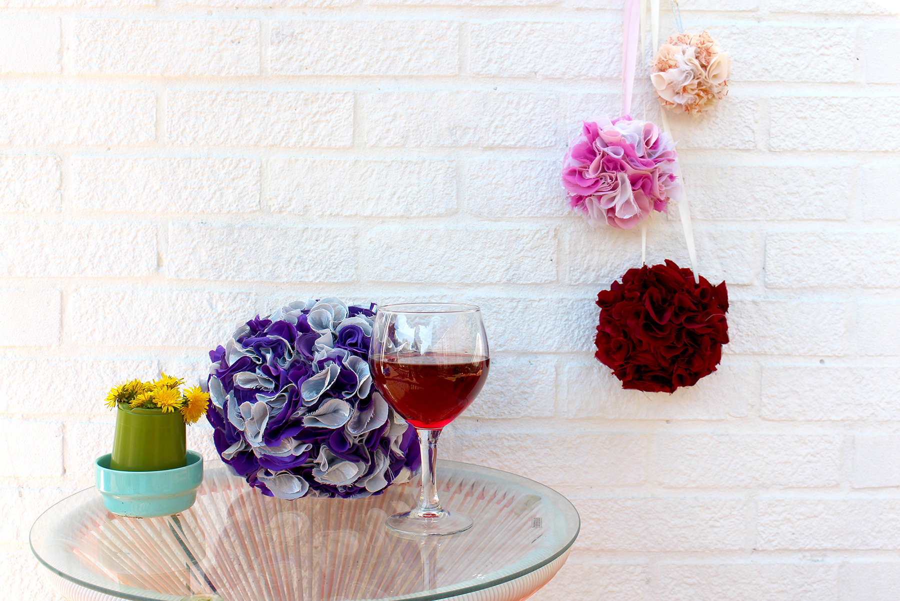 Fabric pom pom project made using recycled clothing