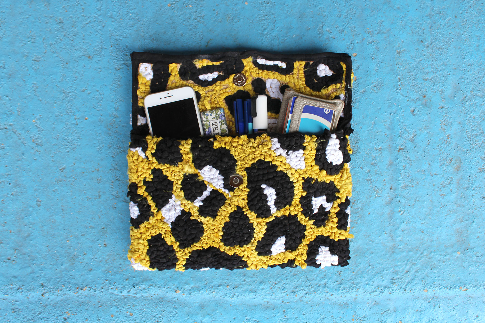 rag rug leopard print bag with items in