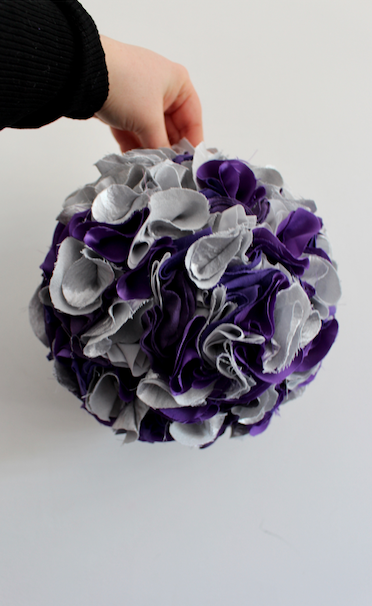 large purple and silver party pom pom