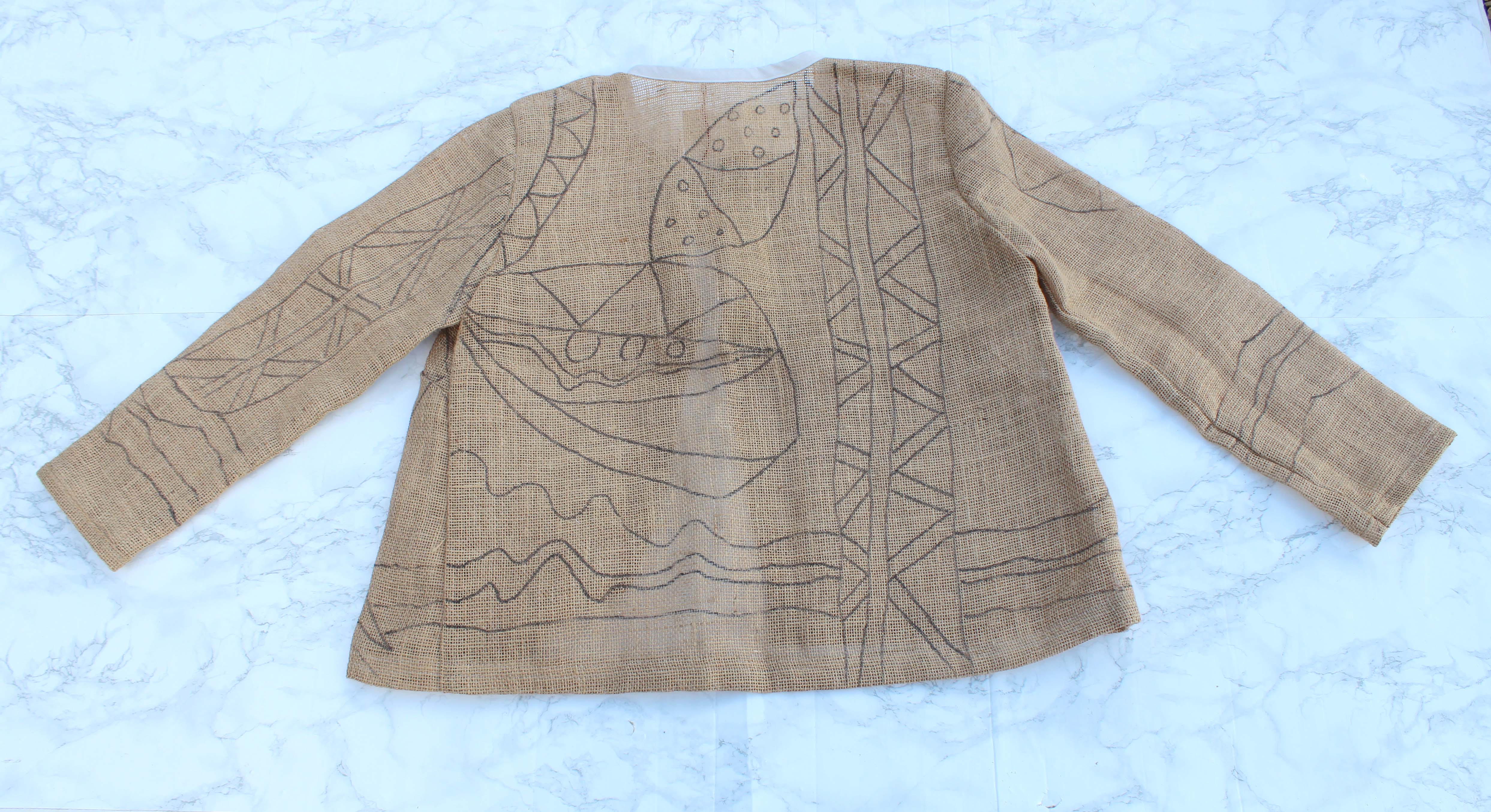 hessian rag rug jacket back view marble background