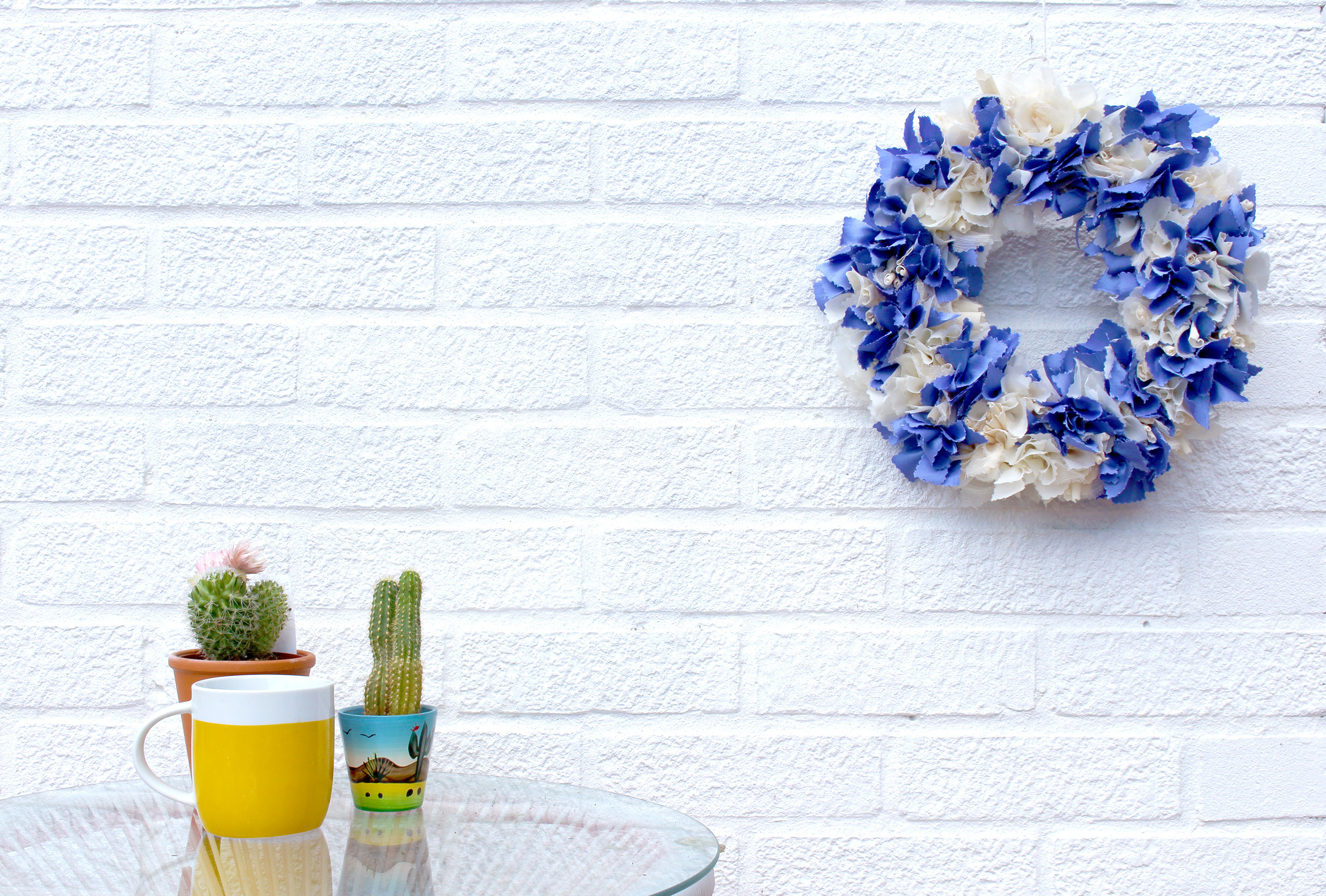 Pinked Rag Rug Wreath Hung on White Wall