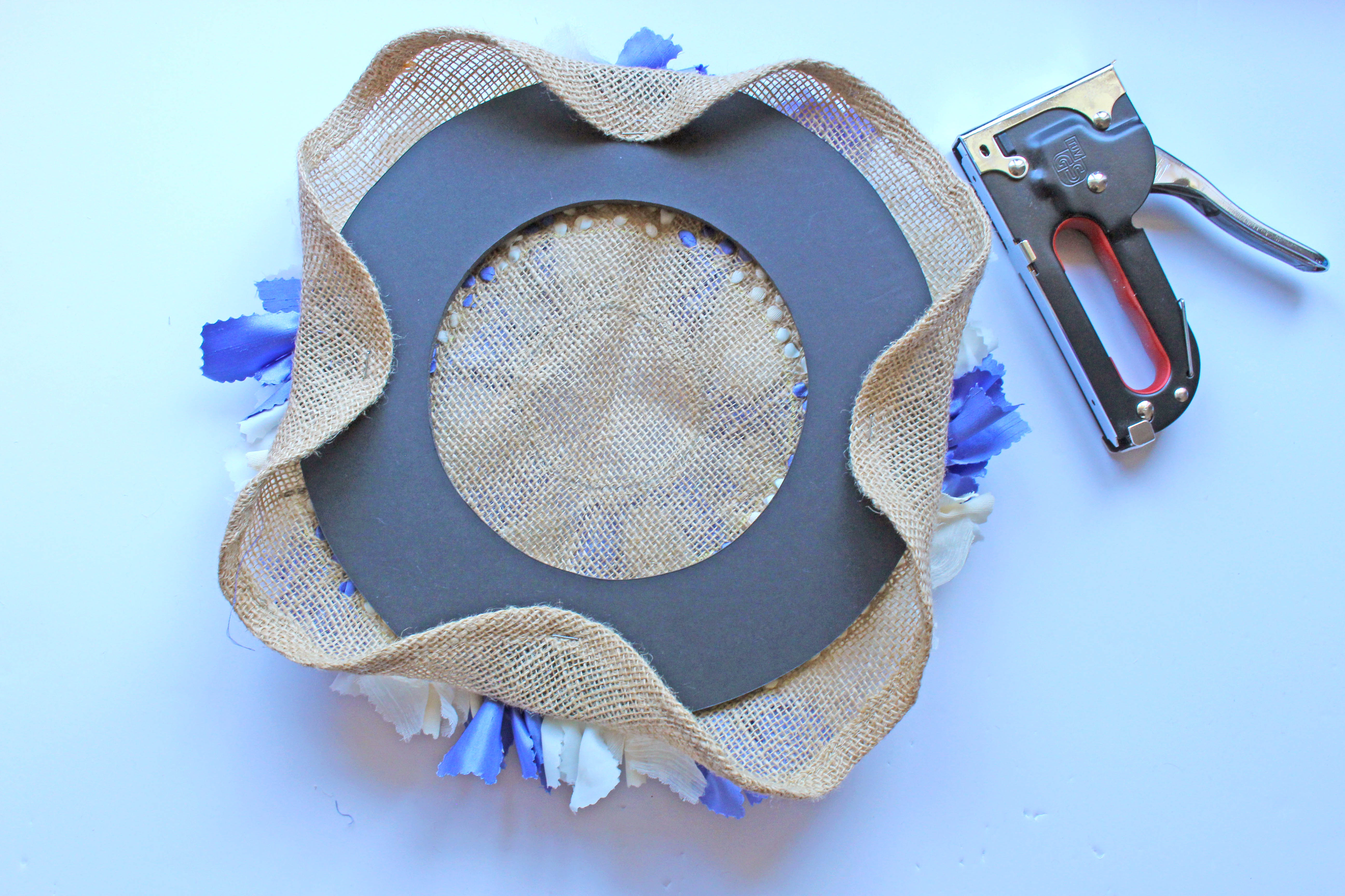 Stapling the Foam Board in Quarters