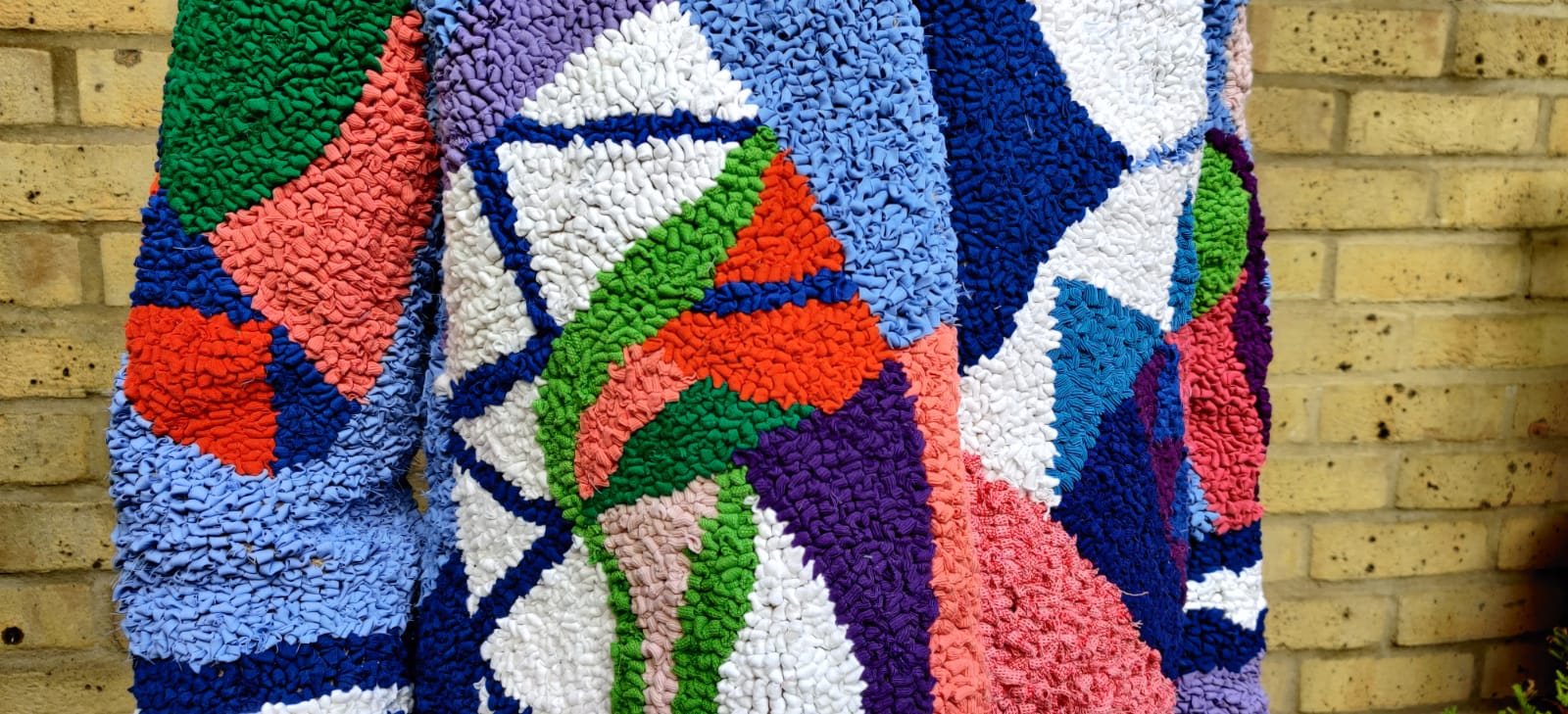 finished rag rug hessian jacket close up view