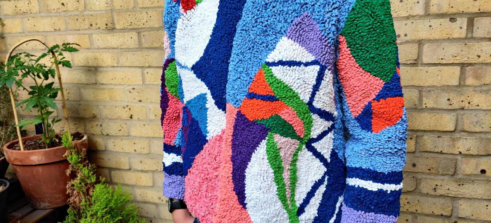 close up view finished rag rug hessian jacket