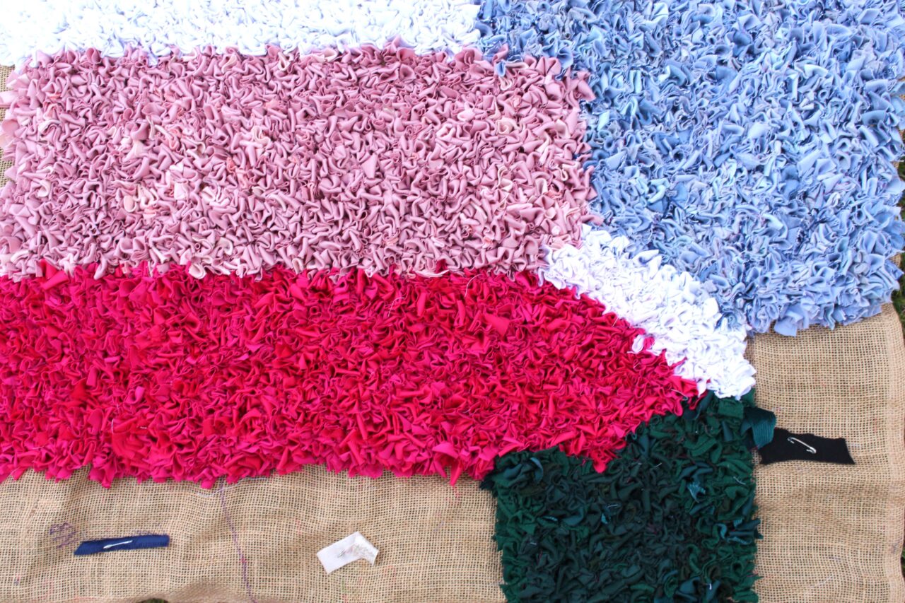 pink white green rag rug work in progress