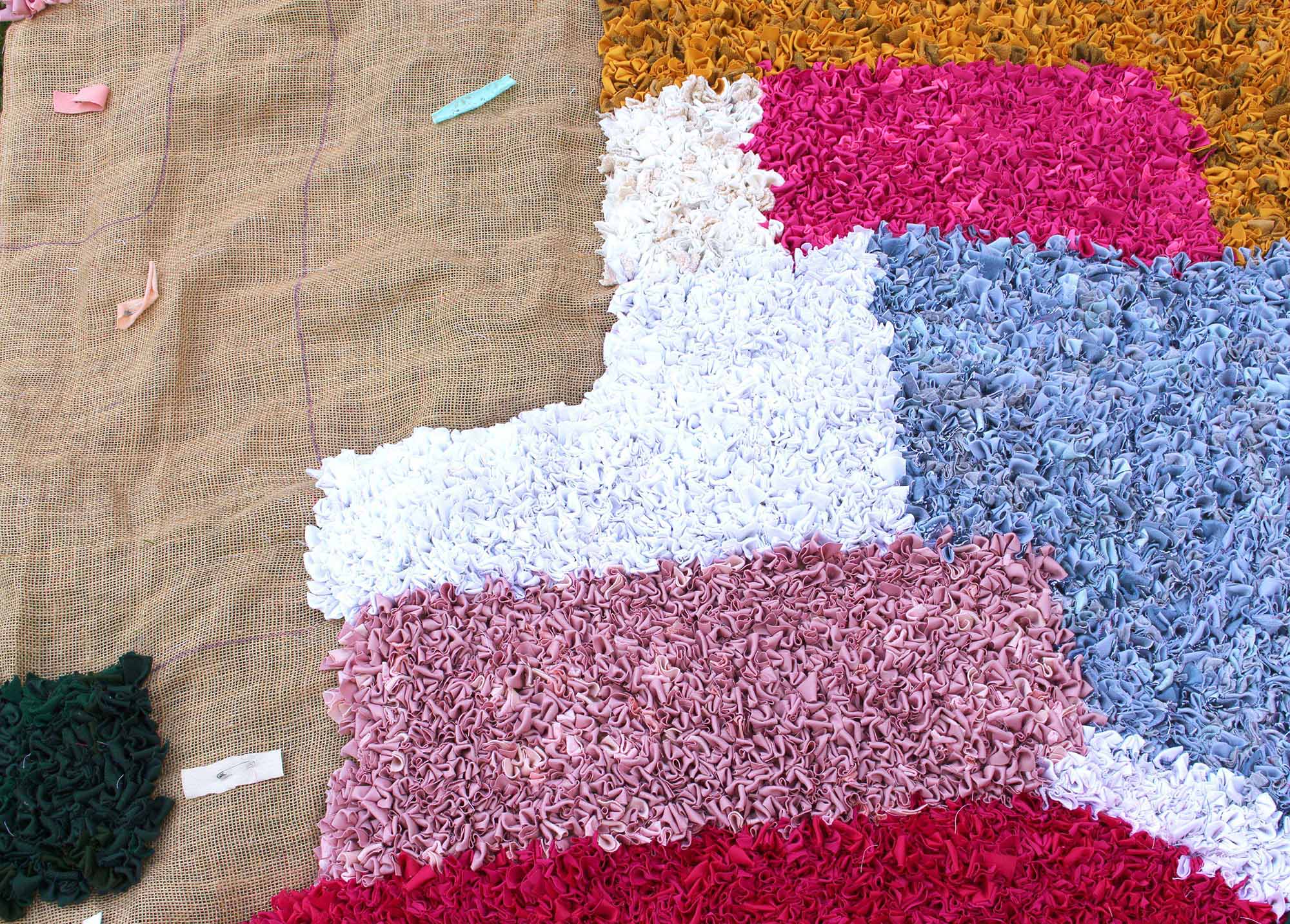 close up view colour block rag rug work in progress